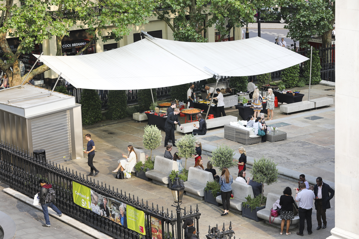 Outdoor event space at St Martin-in-the-Fields with a large tent for gatherings.