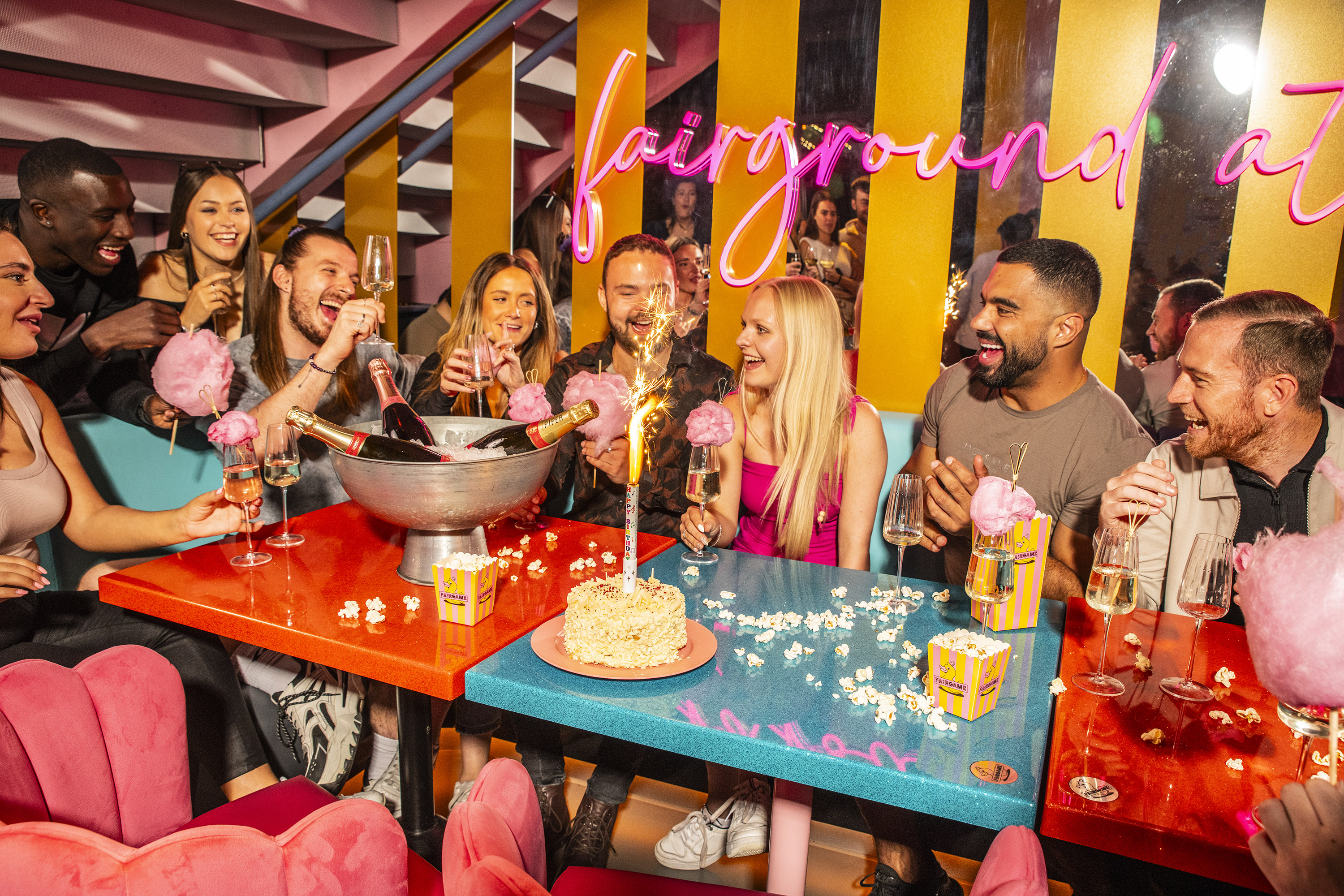 Vibrant carousel event setup with colorful decor for celebrations and gatherings.