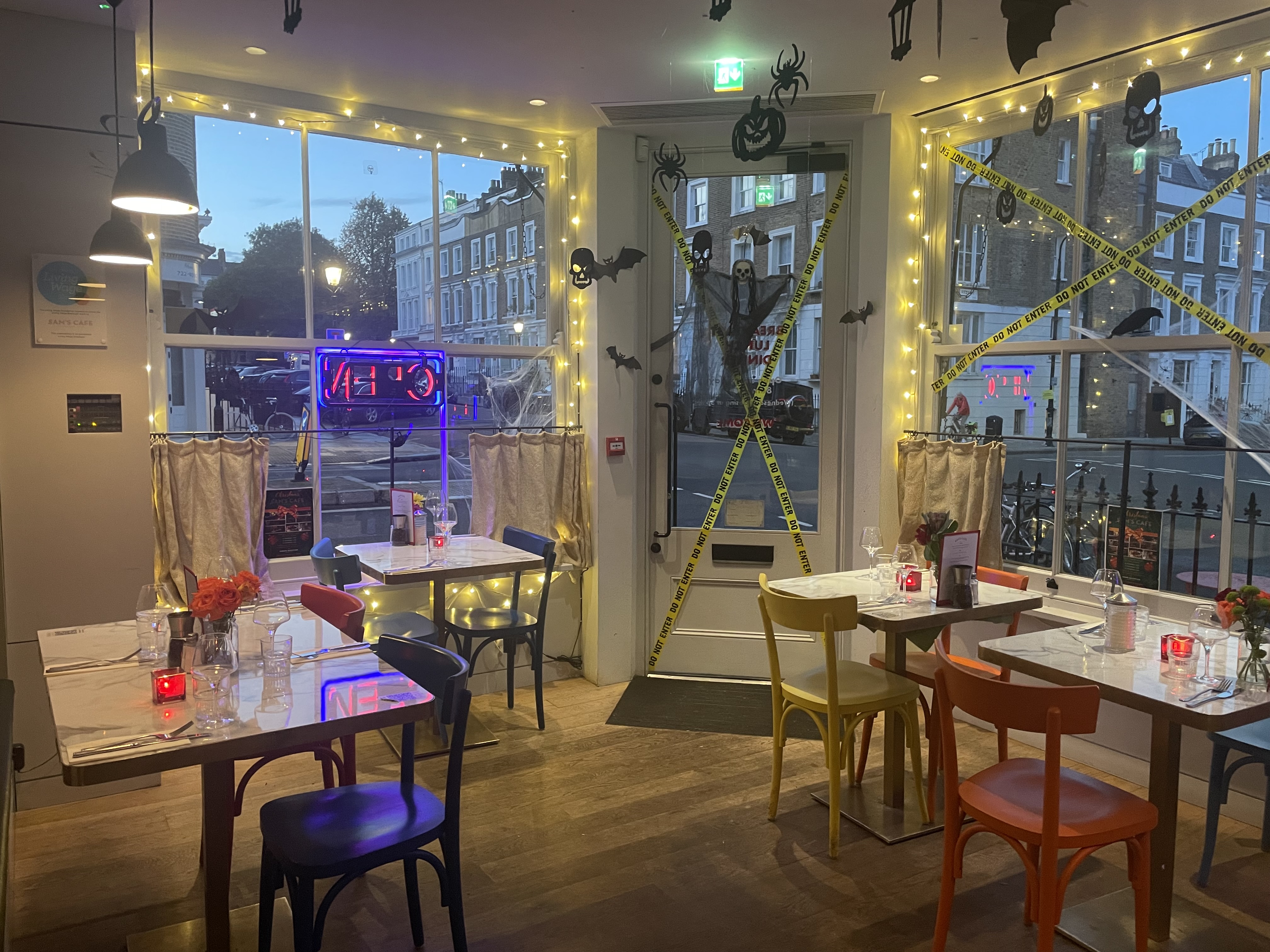 Cozy restaurant in Sam's Cafe with warm lighting, perfect for intimate gatherings and events.