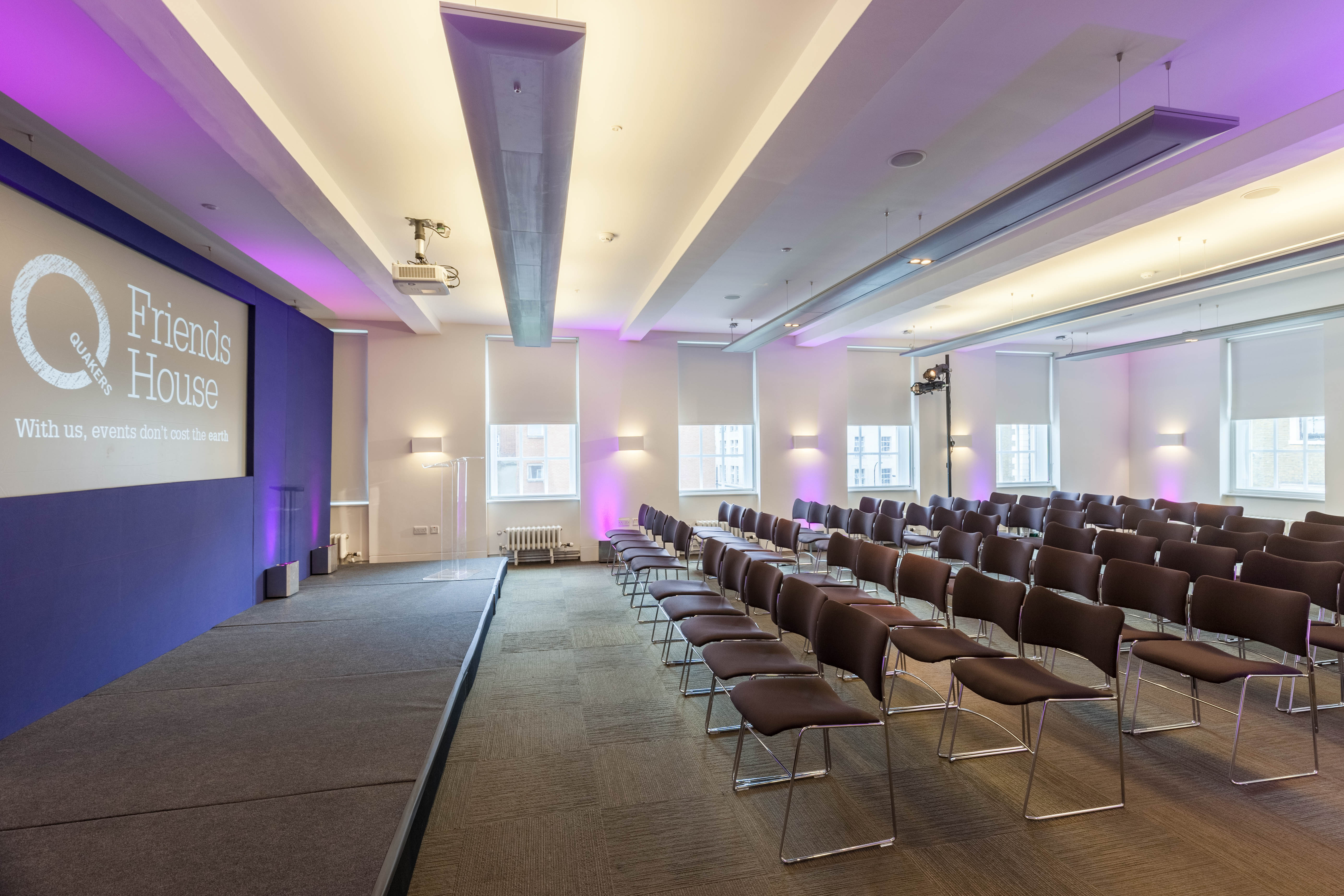 Event space at Friends House with purple accents, ideal for conferences and seminars.
