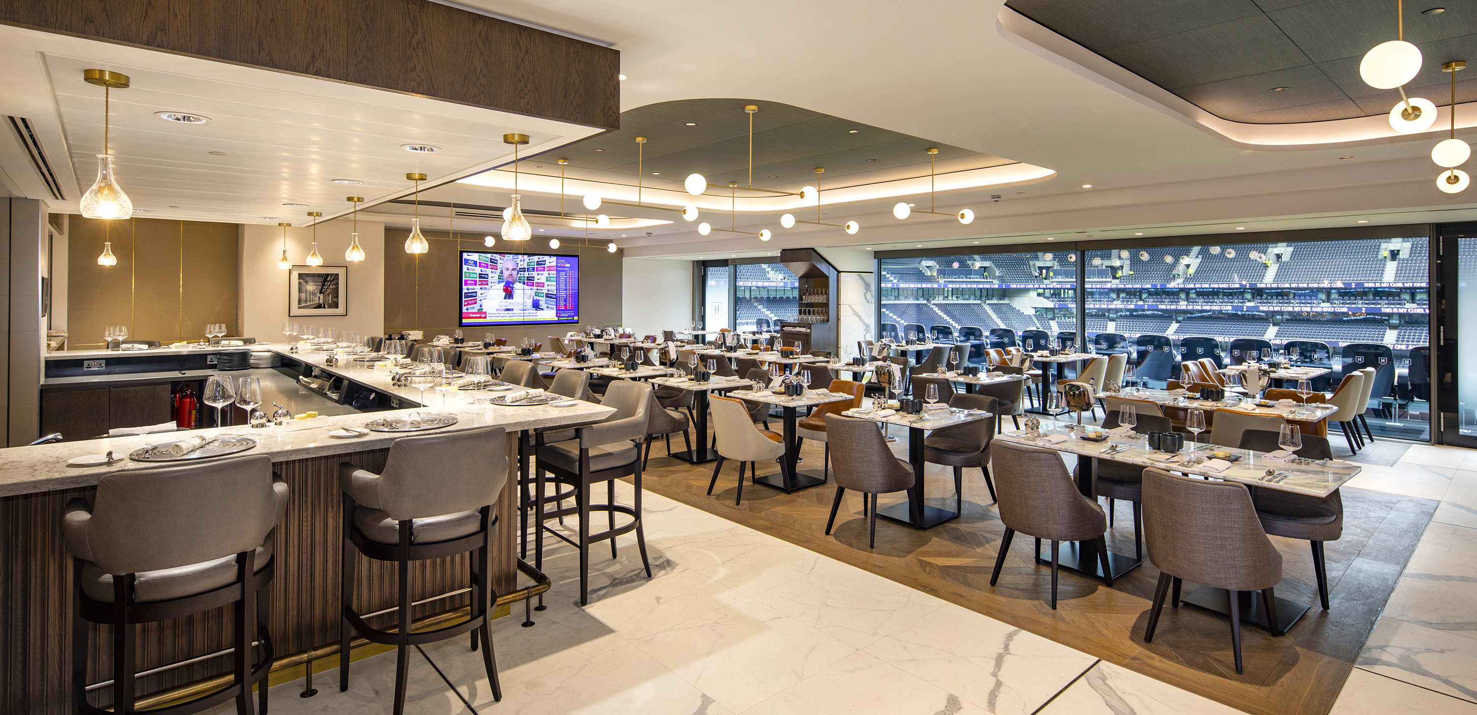 Elegant dining area in The H Club at Tottenham Hotspur Stadium, perfect for corporate events.
