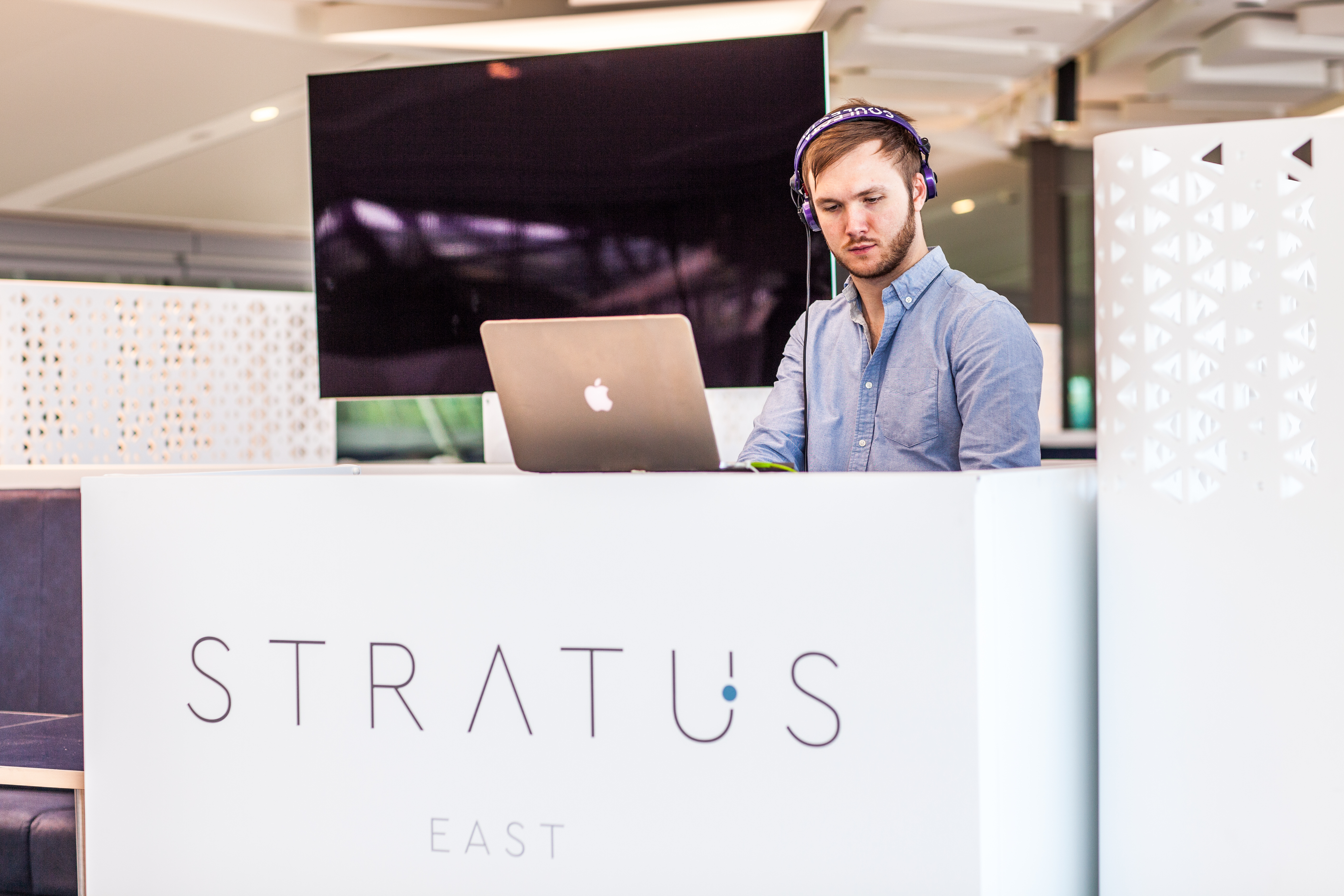 Sleek reception desk at Tottenham Hotspur Stadium for upscale networking events.