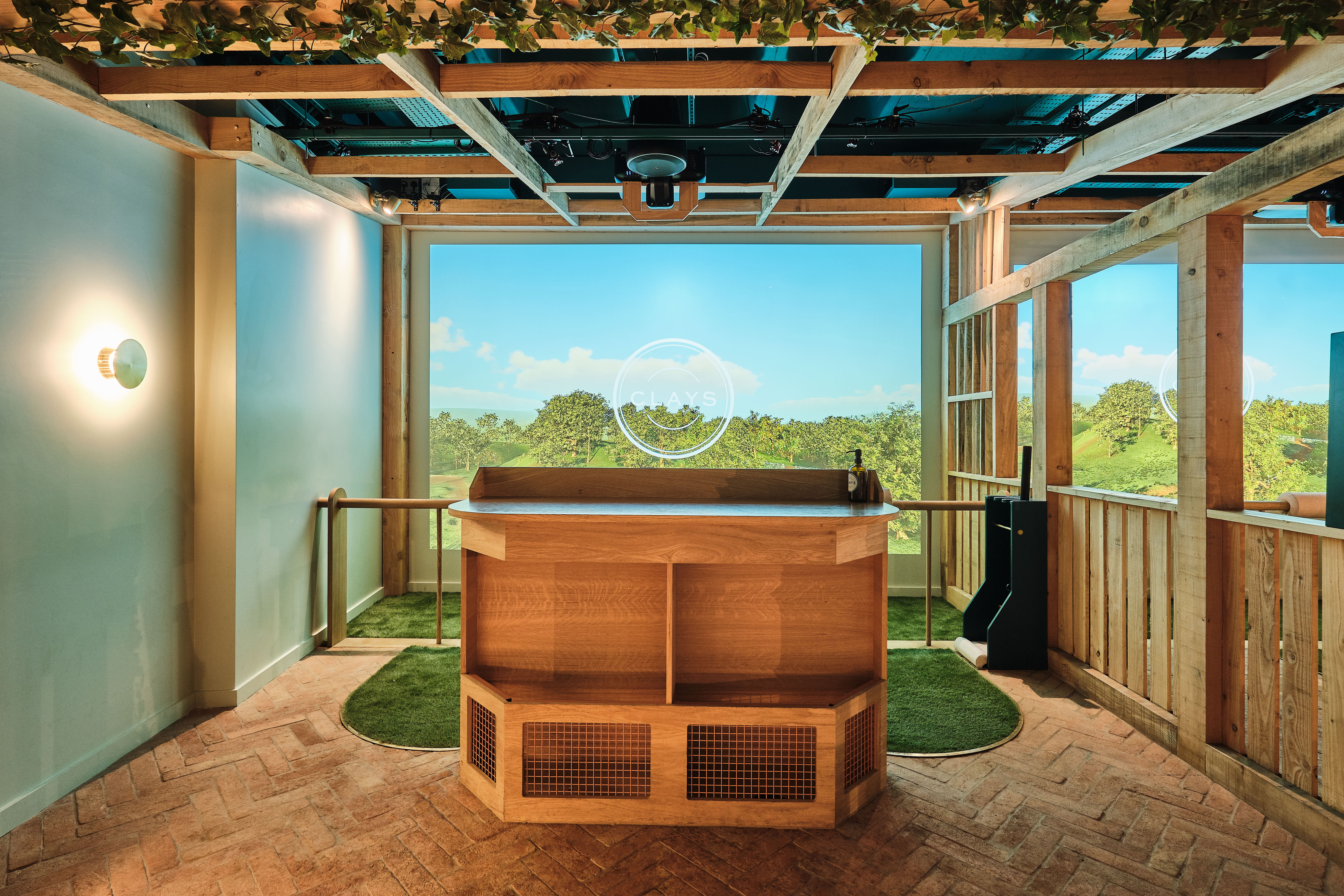 Modern event space in Clays - Moorgate with sleek wooden reception and natural light.