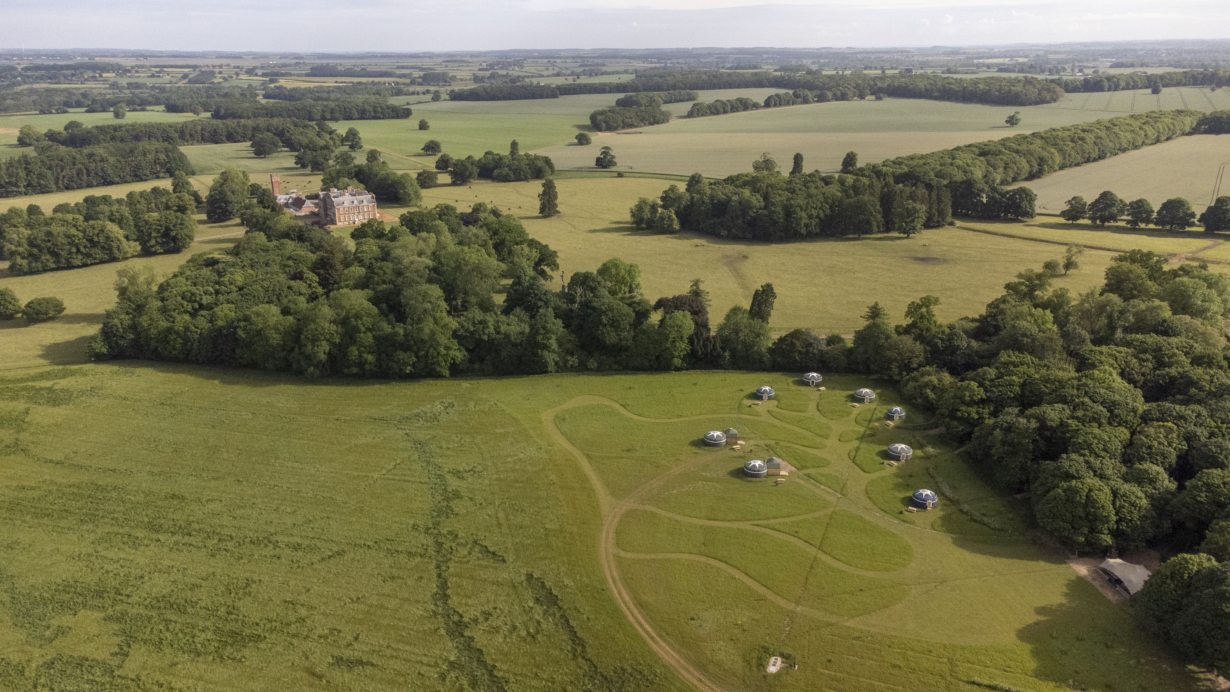 Wild Meadow venue in Raynham with green fields, ideal for retreats and team-building events.