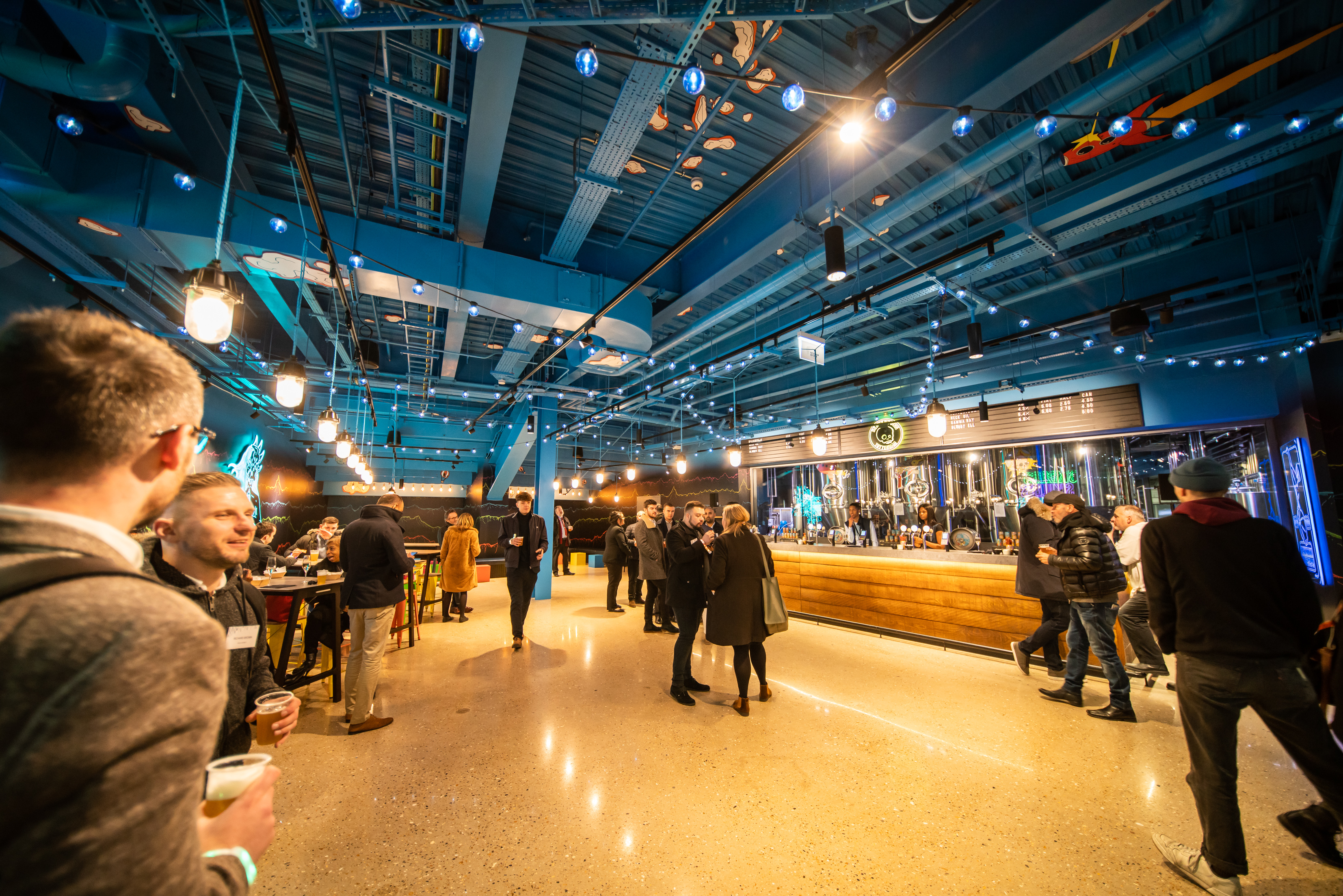 Beavertown Taproom at Tottenham Hotspur Stadium, vibrant event space for networking and mingling.