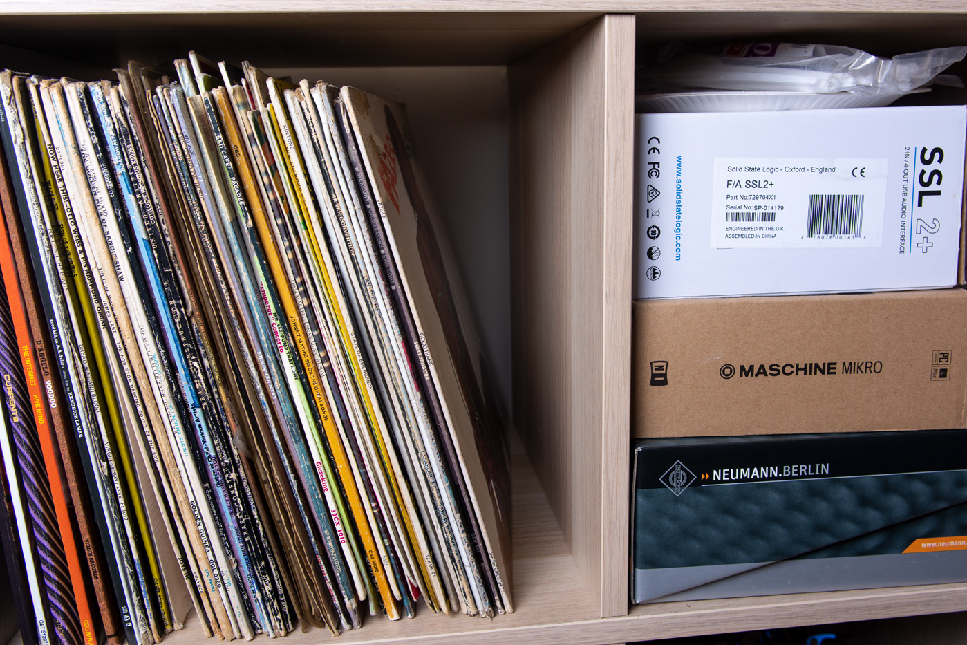 Vinyl records and audio gear in a creative space for music events and performances.