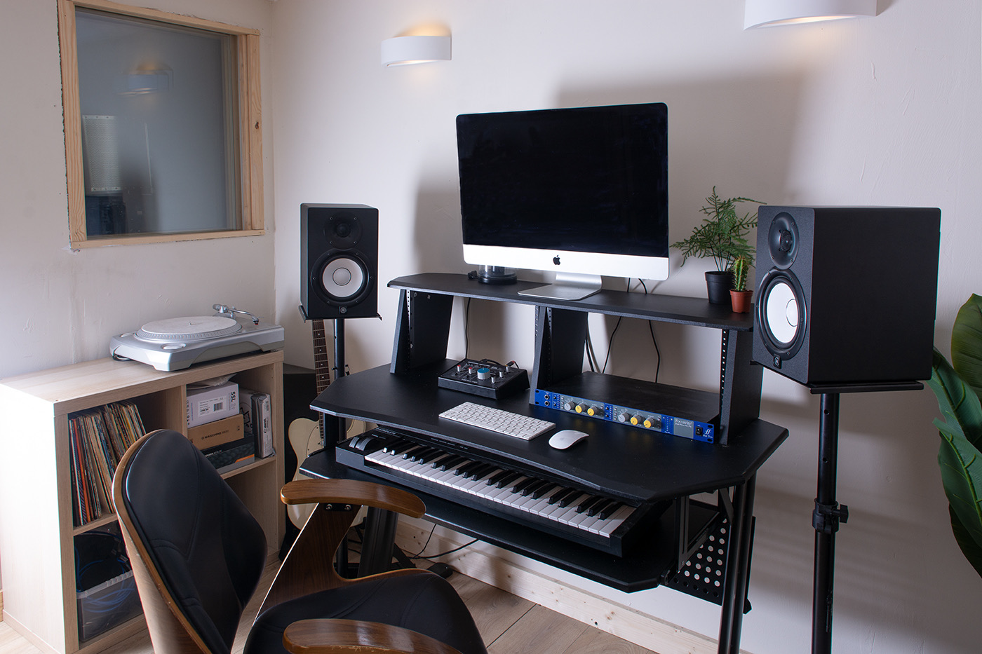 Modern workspace with sleek computer setup for virtual events and hybrid meetings.