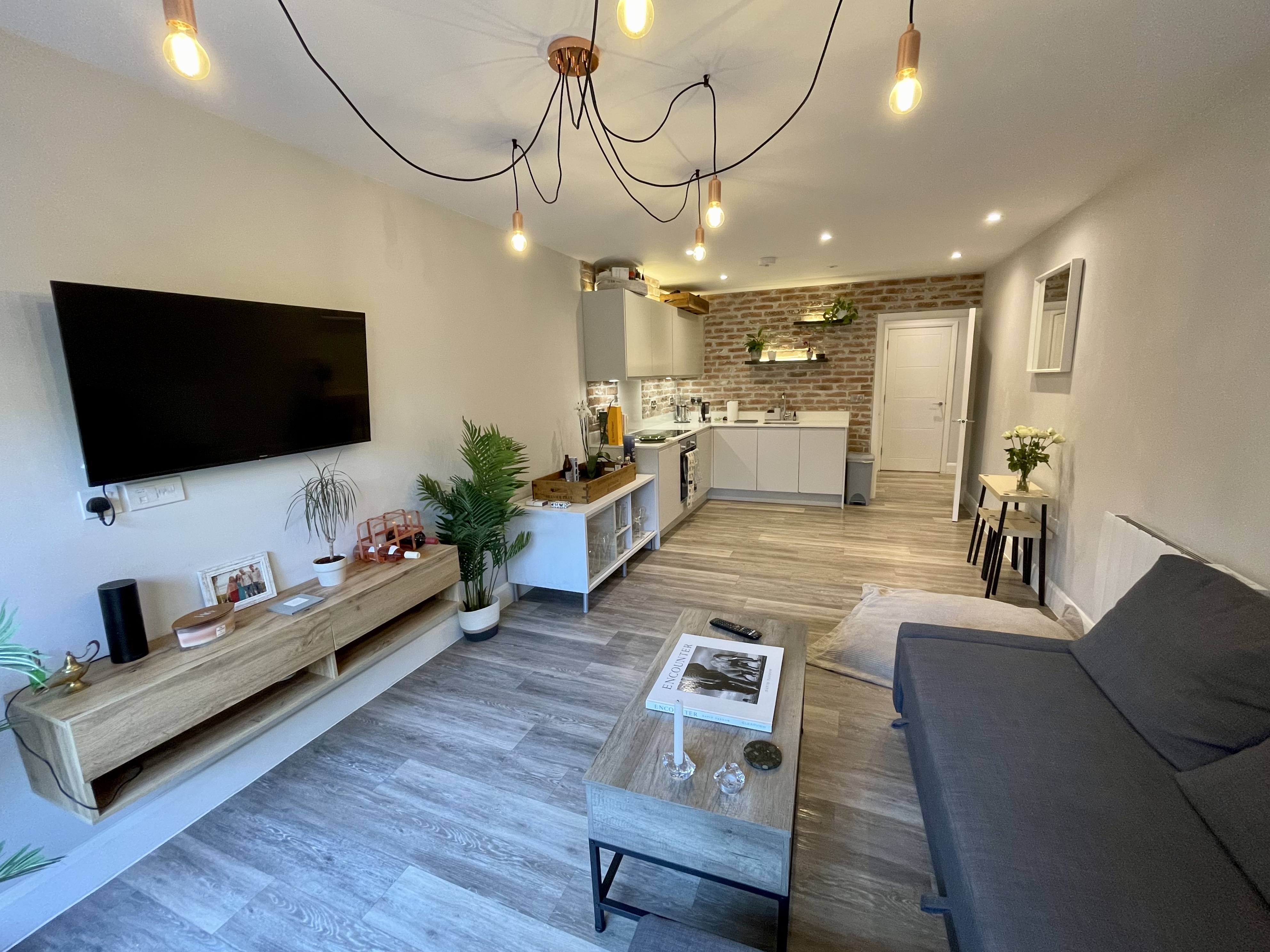 Modern meeting space in Immaculate Windsor Apartment, ideal for events and collaboration.