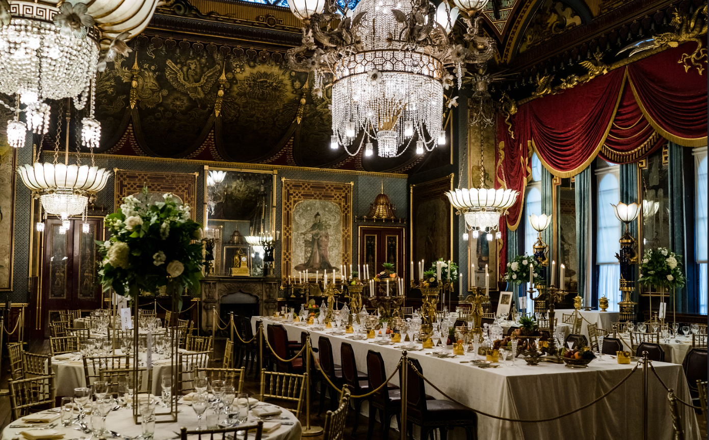 Banqueting Room in Royal Pavilion with opulent chandeliers, ideal for weddings and galas.