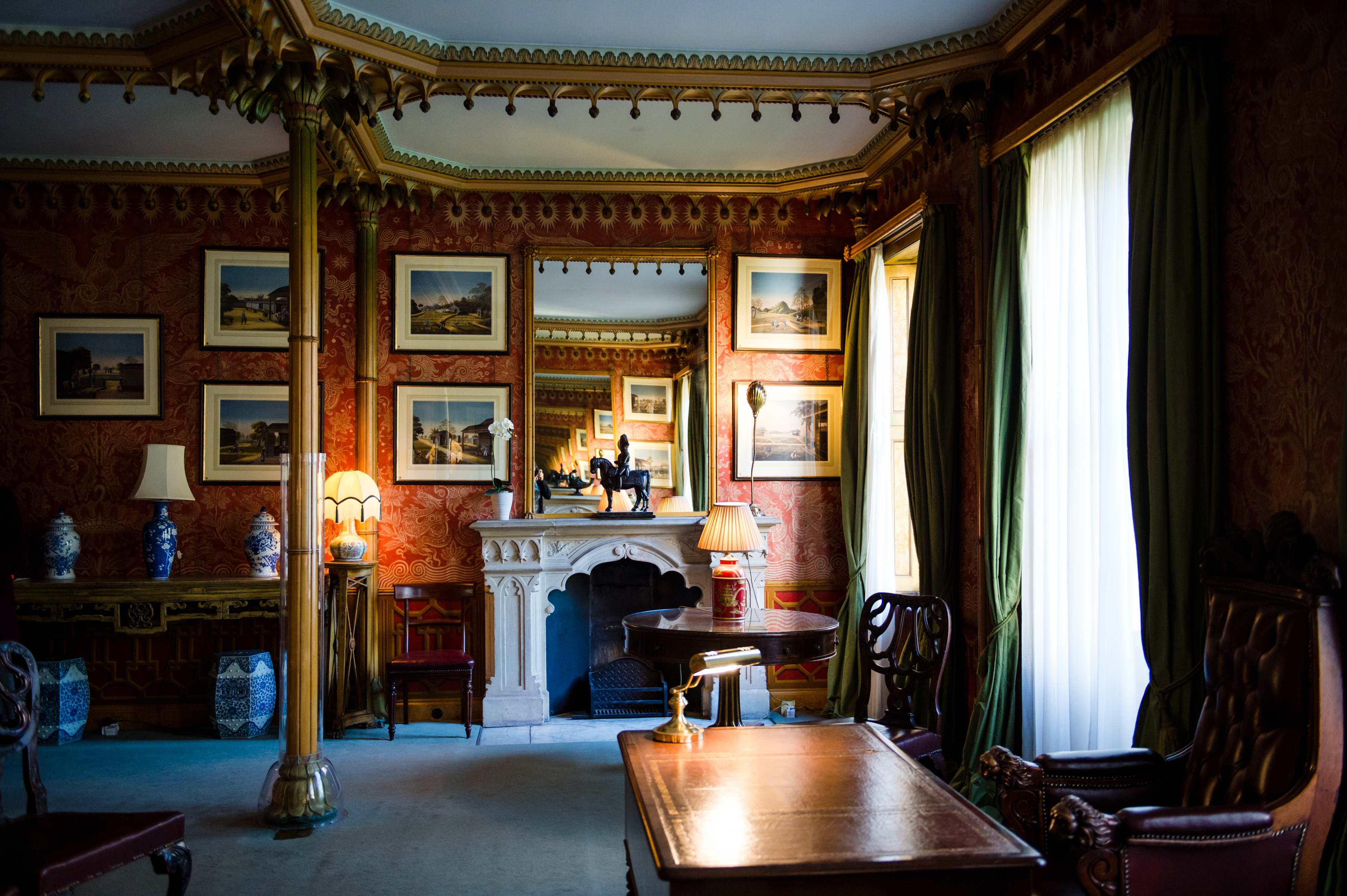 Red Drawing Room in Royal Pavilion, elegant decor for intimate gatherings and meetings.