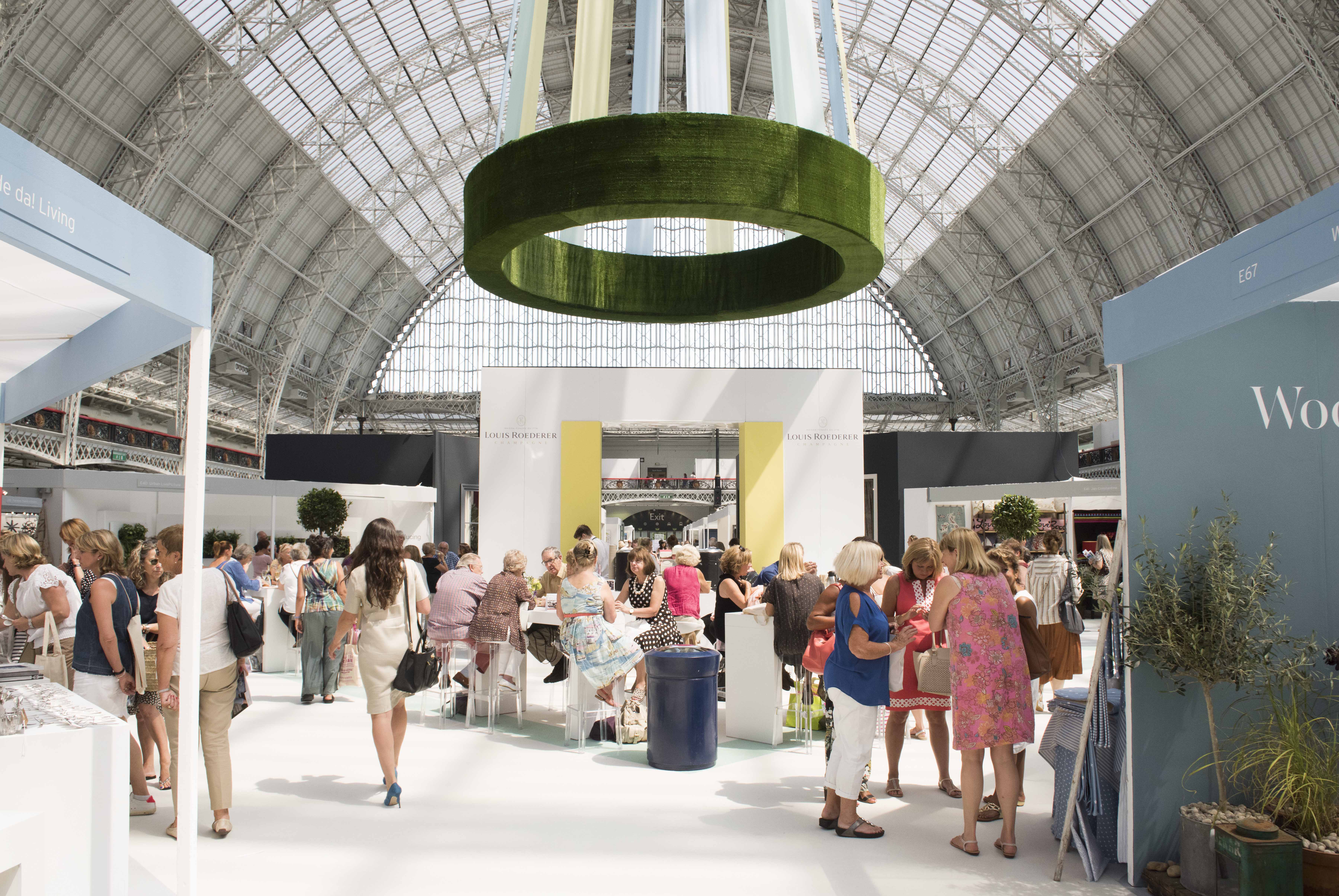 Grand Hall in Olympia: vibrant event space with high ceiling for networking and exhibitions.