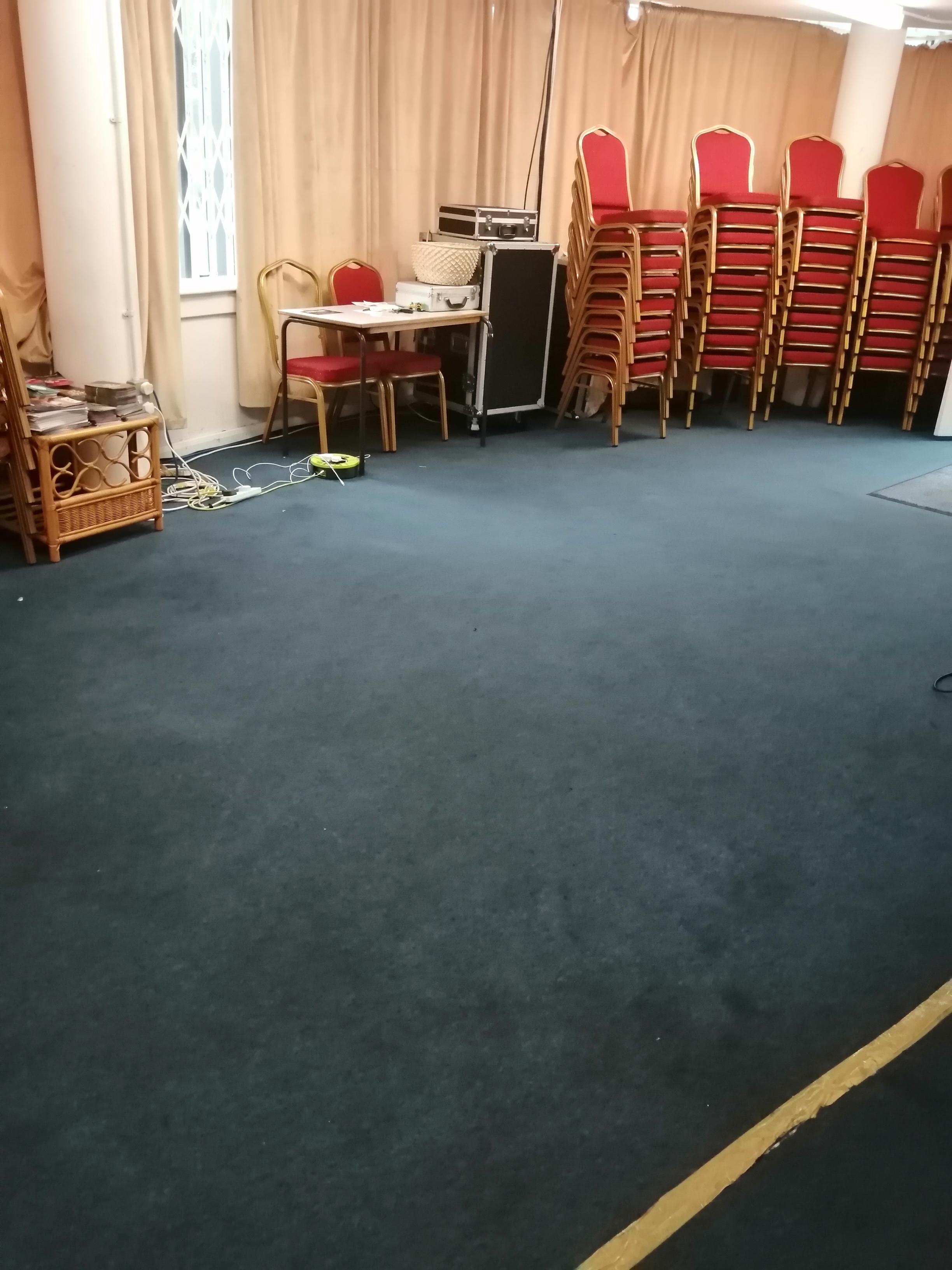 Meeting space in The Healing Centre with empty chairs for workshops or gatherings.