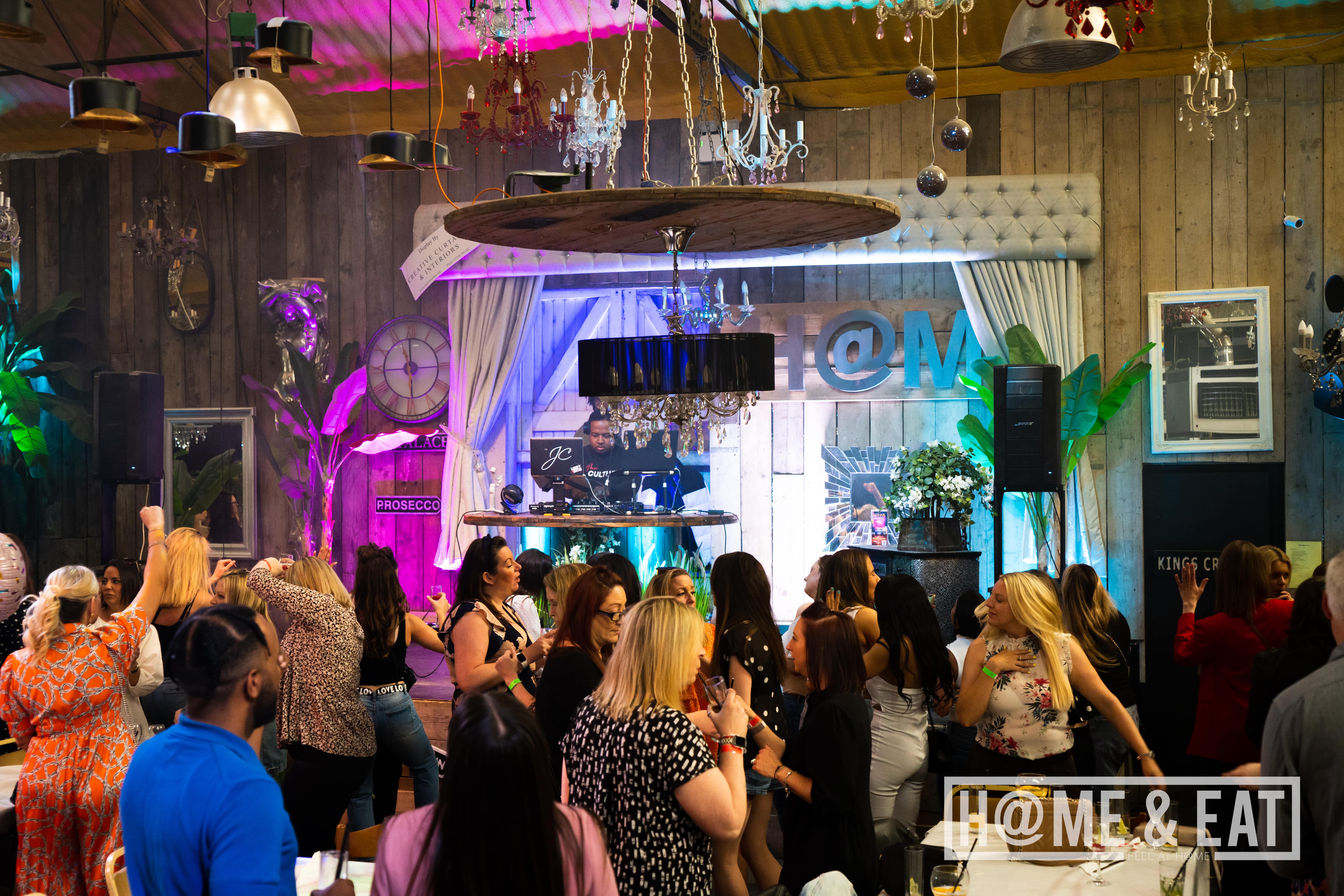 Vibrant event space with colorful lighting for social gatherings and celebrations.