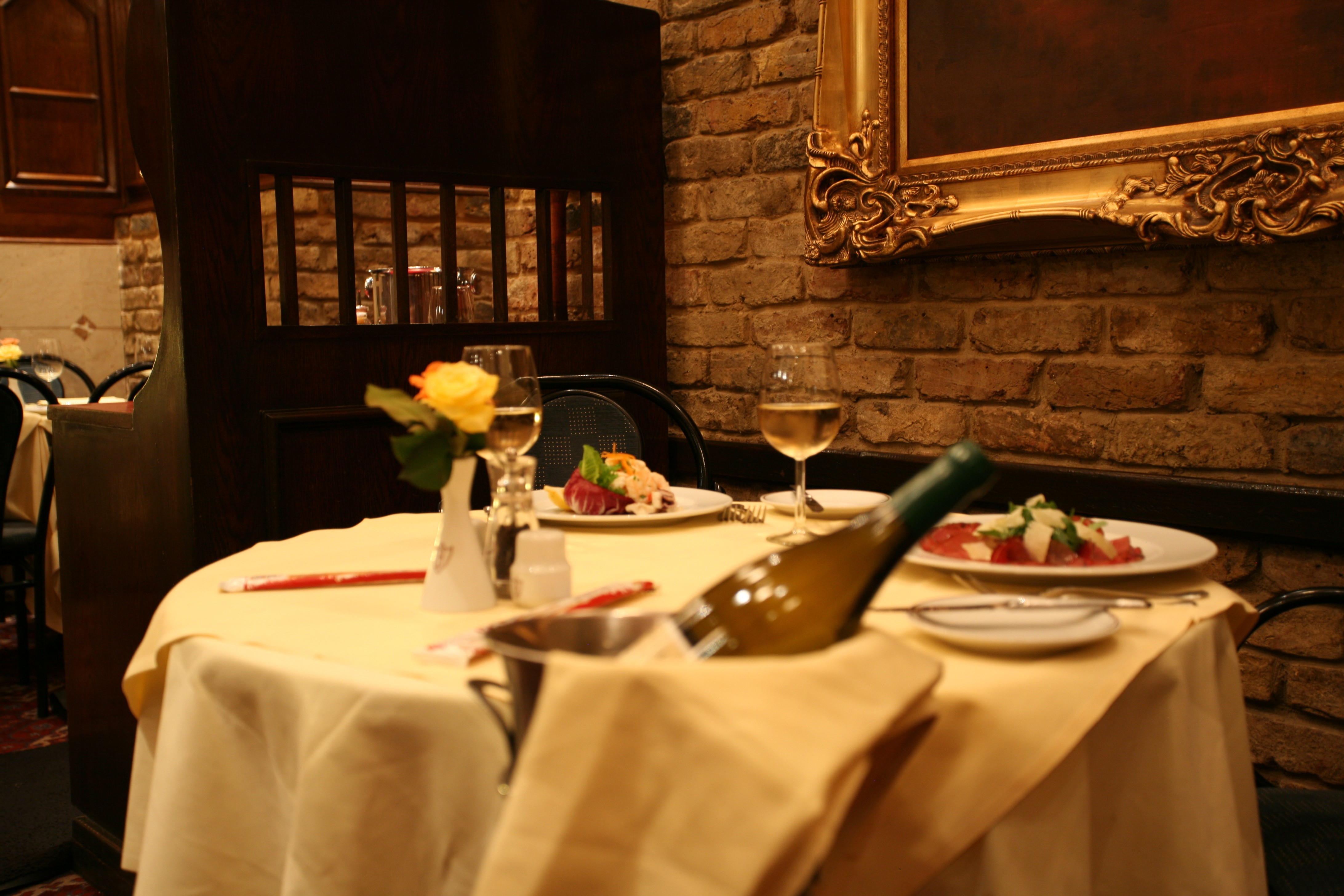 Intimate dining setup at Bolton's Restaurant for corporate dinner and networking event.