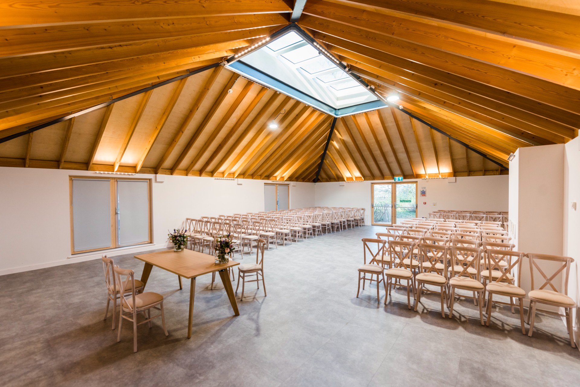 Sky Room in The Glass House, featuring a high wooden ceiling for events and presentations.