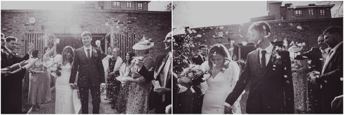 Joyful wedding couple exiting ceremony with confetti at The Glass House Sky Room.