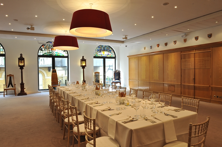 Elegant event space with stained glass windows for corporate dinners and private events.