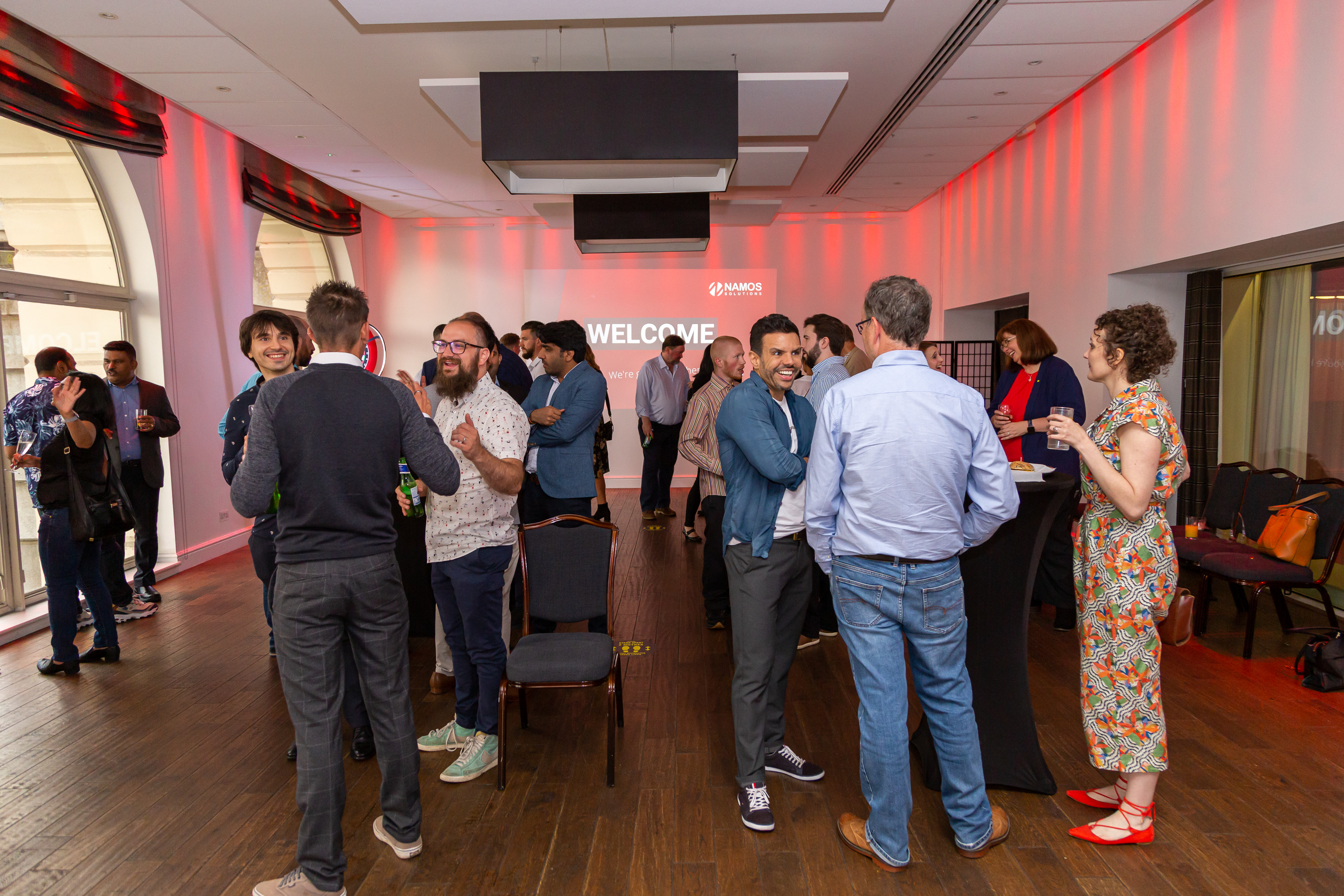 Vibrant networking event in The River Room, Glaziers Hall with modern decor and refreshments.