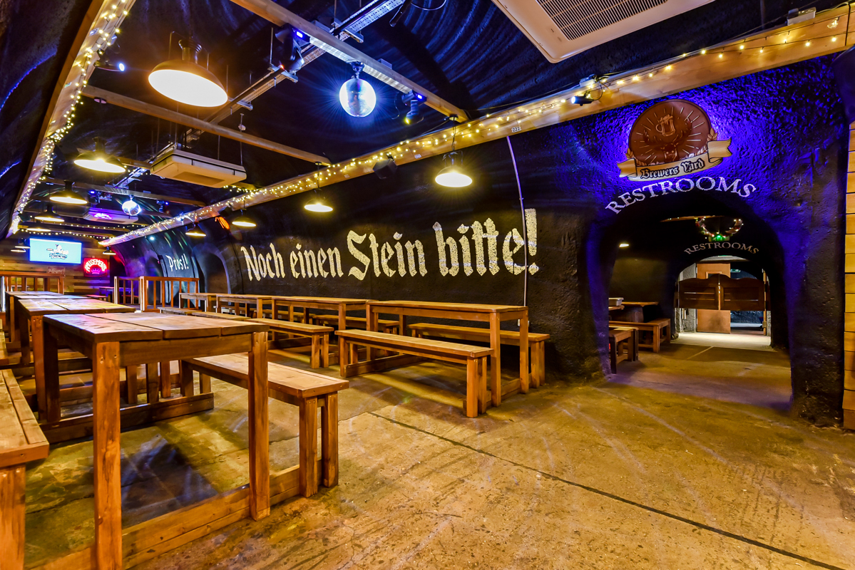 Bermondsey Bierkeller: rustic venue with vibrant art for casual gatherings and events.