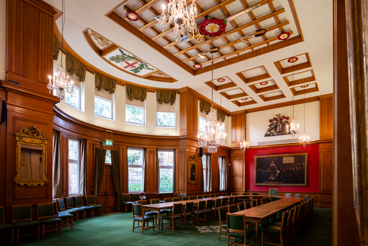 Great Hall at Barber-Surgeons’ Hall, elegant wood paneling, ideal for formal meetings.