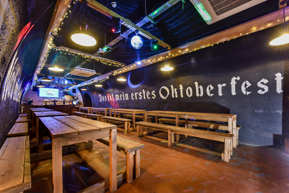 Bermondsey Bierkeller at London Bridge, rustic seating for Oktoberfest celebrations.