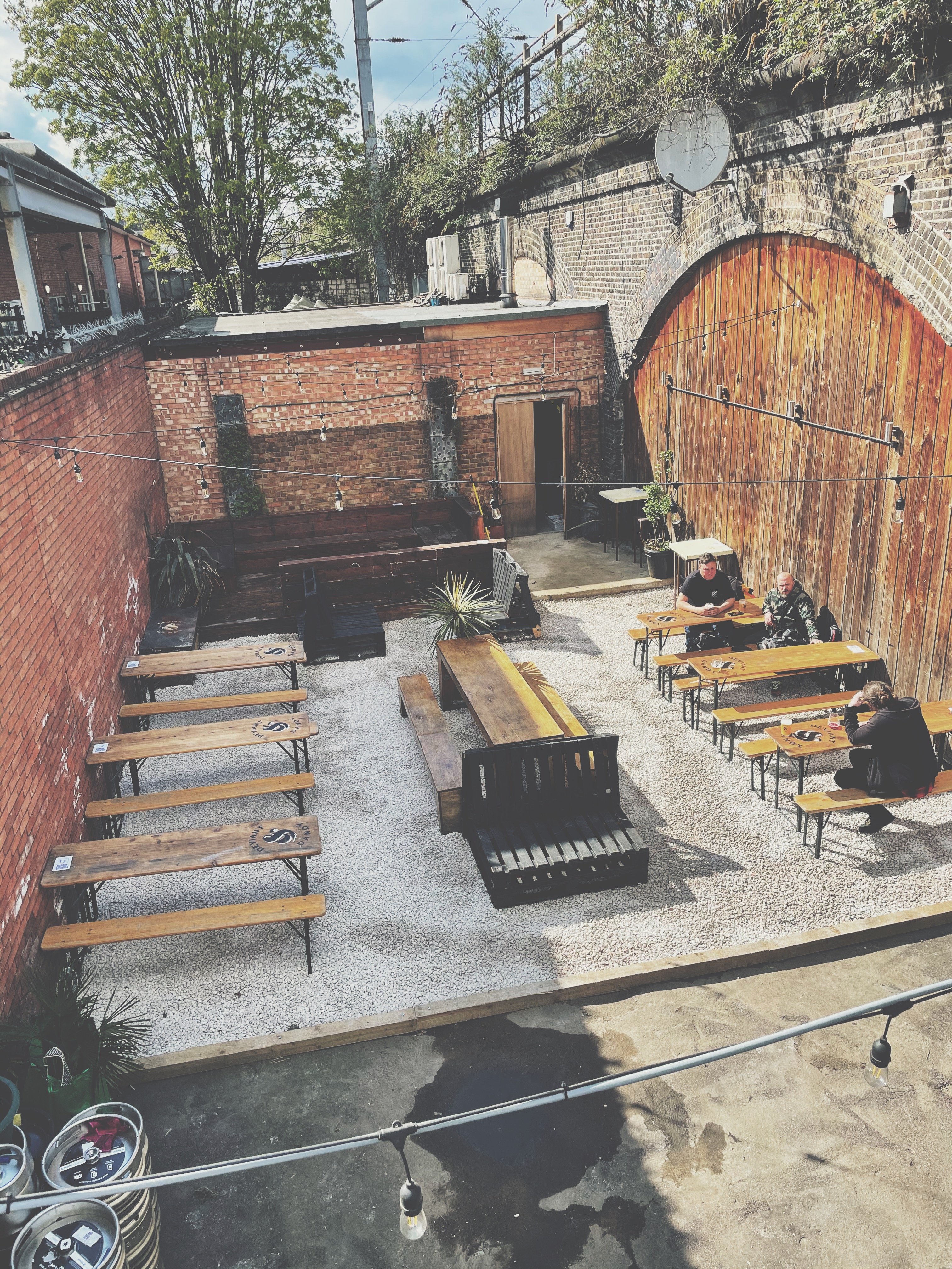 Outdoor venue at Deviant & Dandy Brewery with rustic charm for casual events.