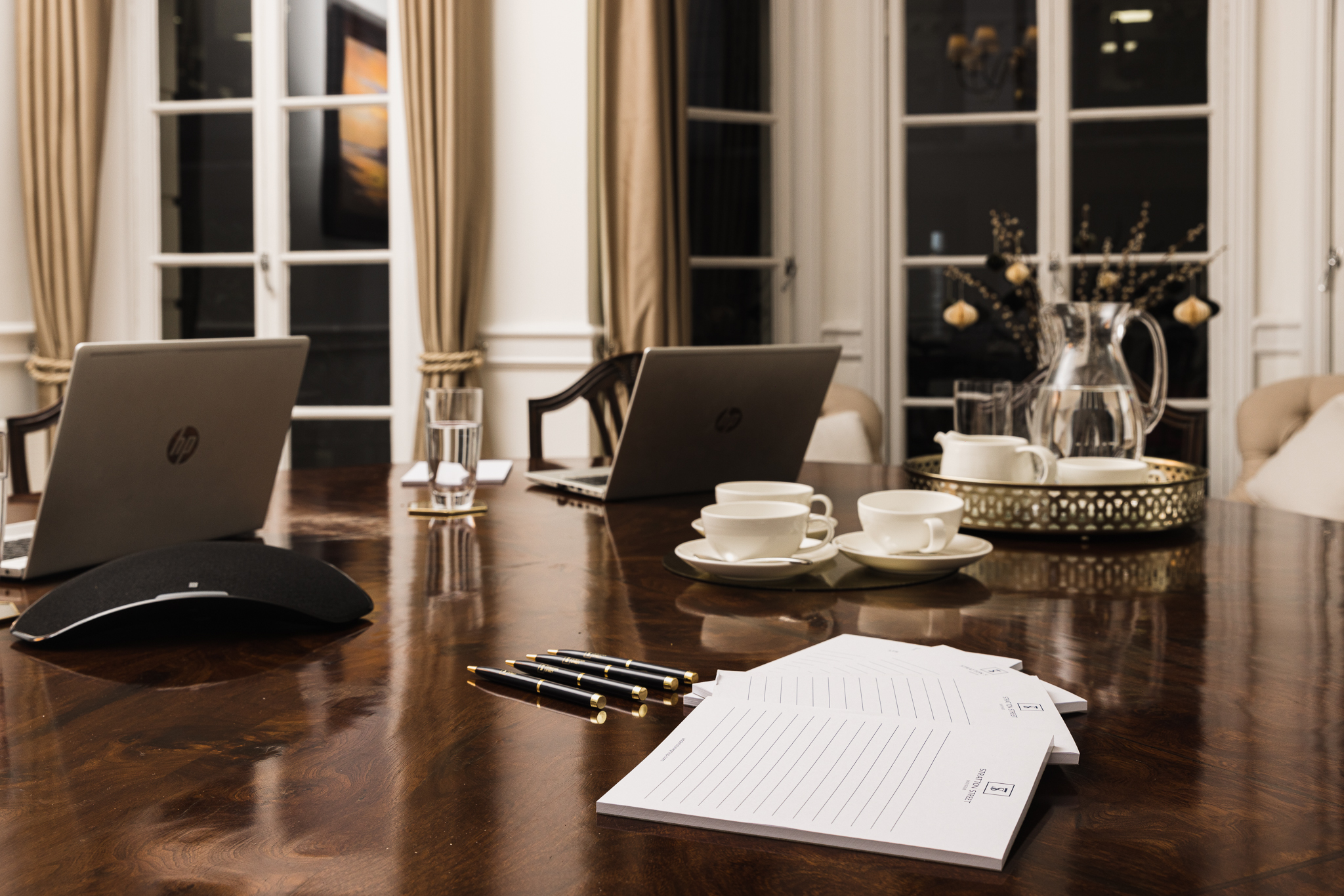 Sophisticated meeting room with laptops, ideal for strategic planning sessions.