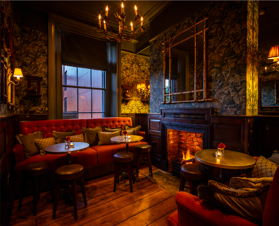 Cozy Cocktail Lounge with plush seating, ideal for networking events and gatherings.