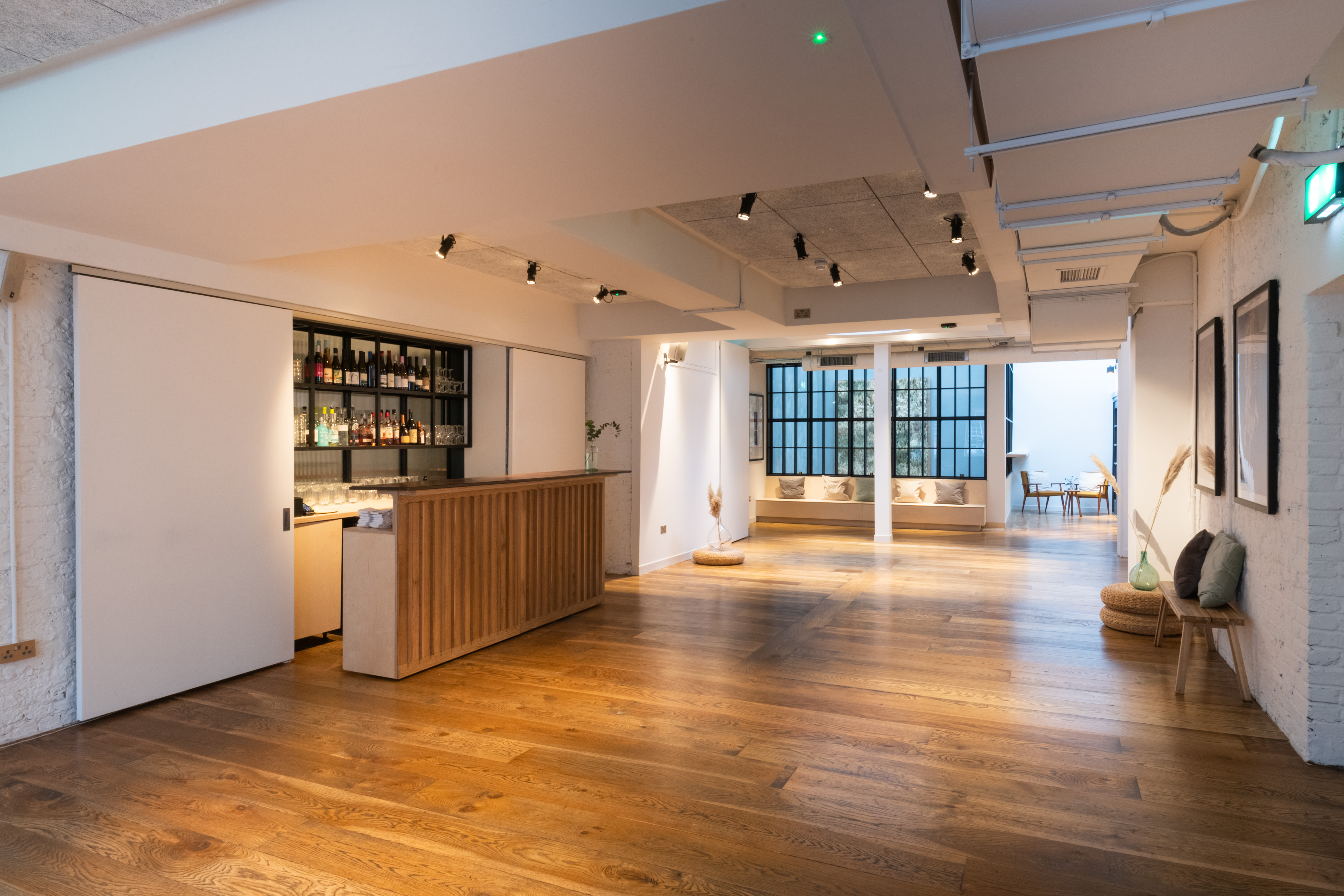 Versatile event space in Carousel London with sleek bar, ideal for networking and gatherings.