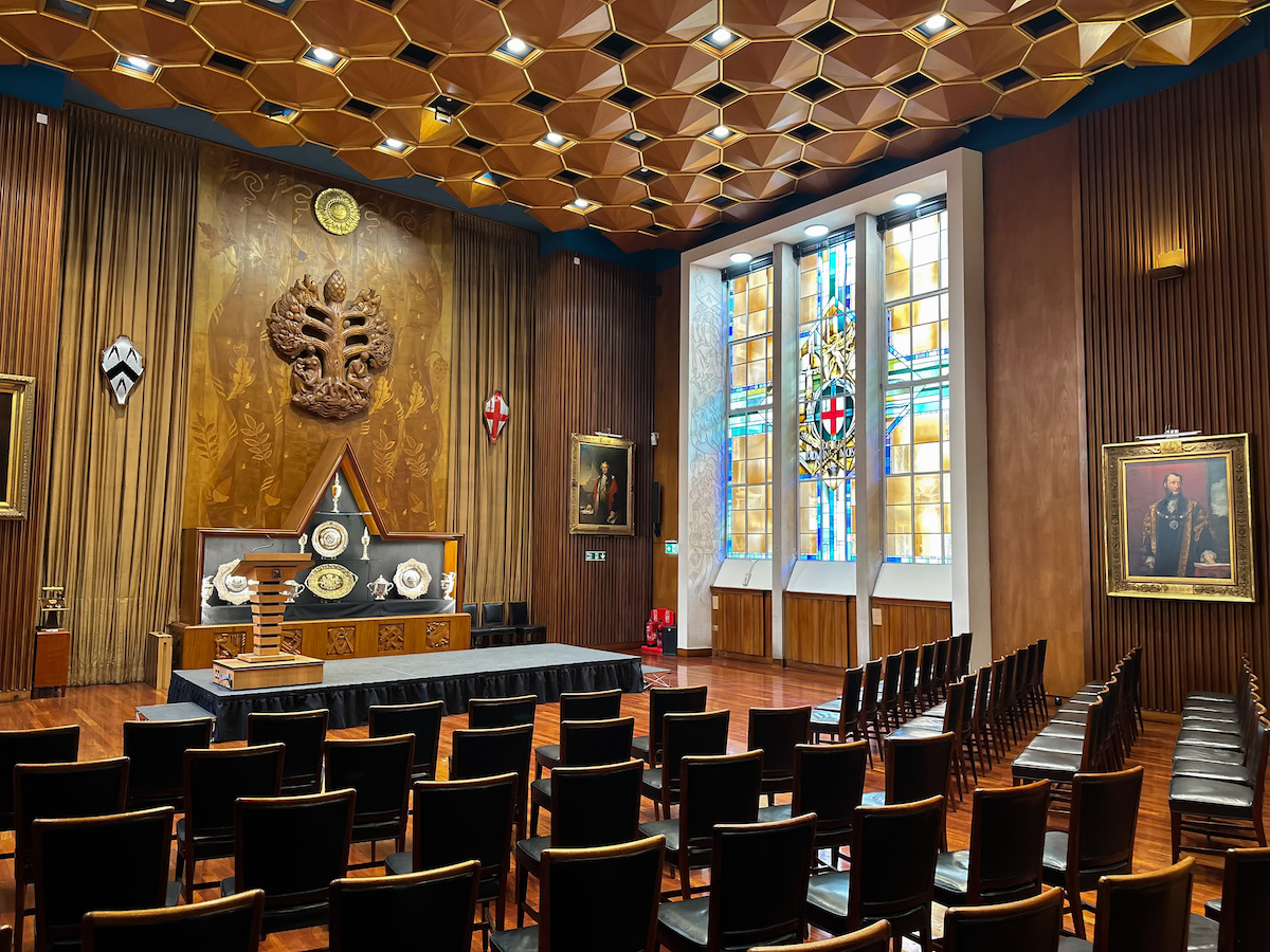 Elegant Livery Hall with wooden paneling, perfect for formal meetings and ceremonies.