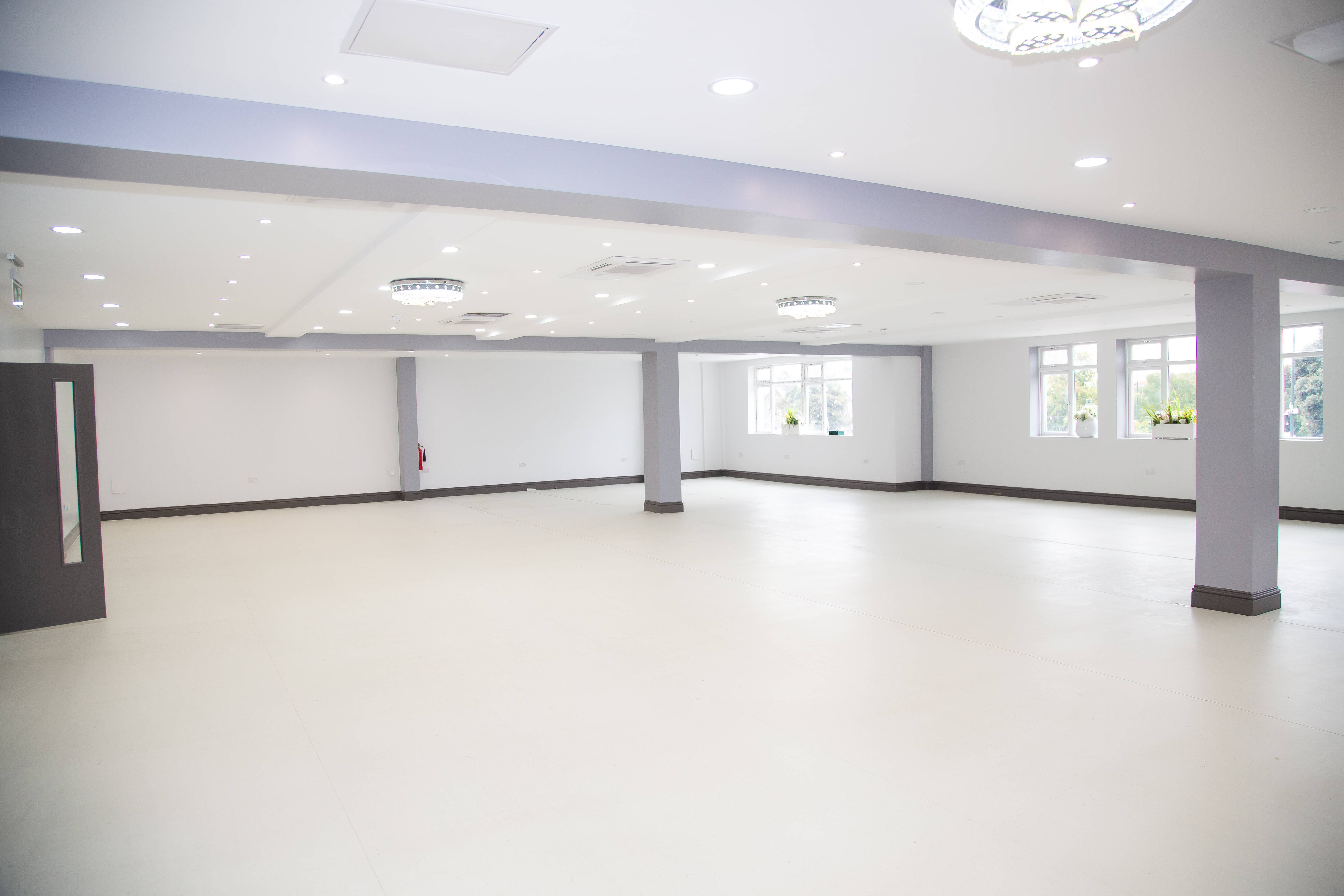Main Auditorium at P2 Event Centre, versatile space with natural light for events.