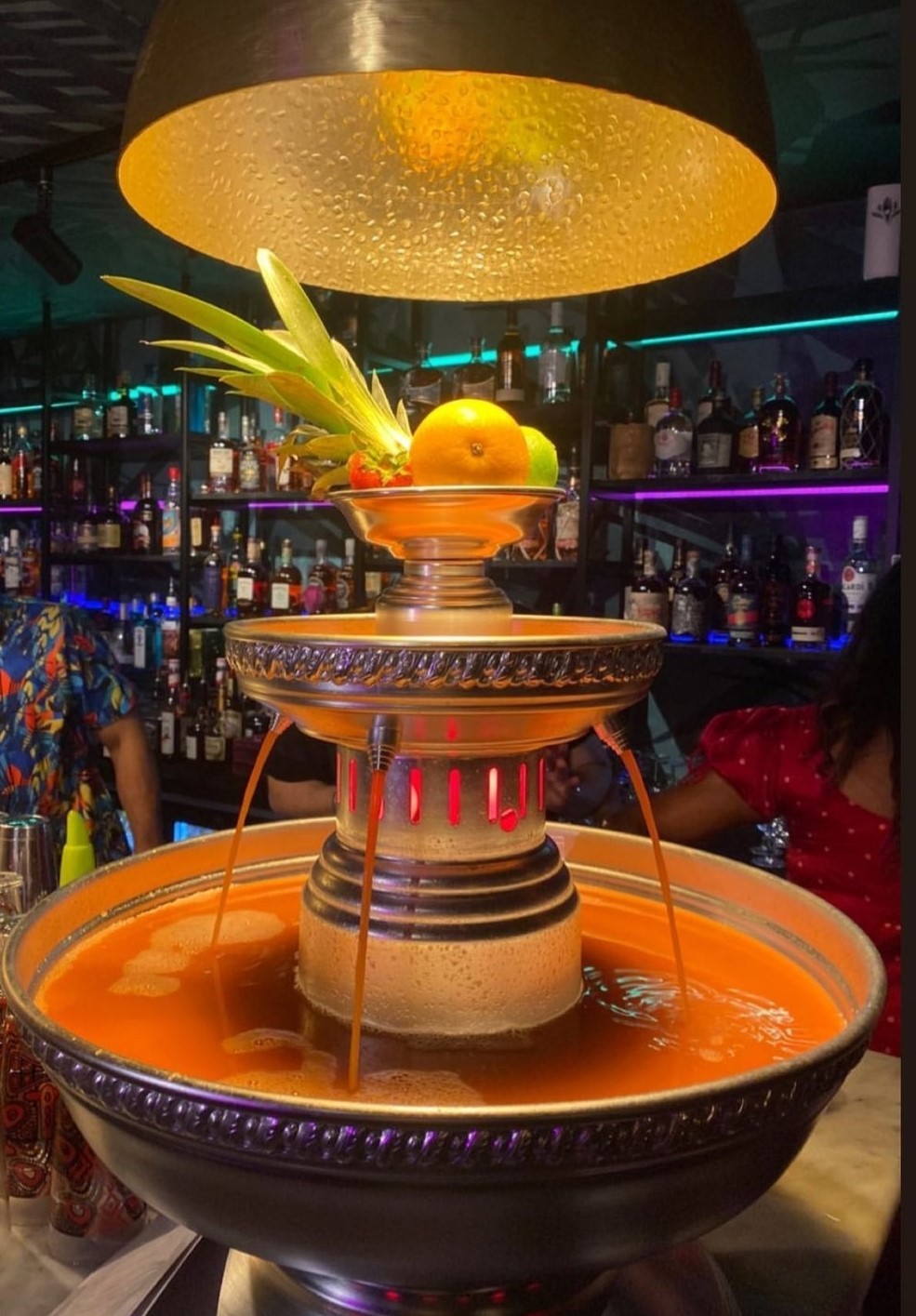 Vibrant beverage fountain at Cottons Club, perfect for themed parties and networking events.