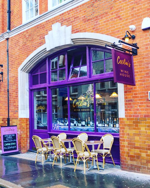 Vibrant purple wine house venue for intimate gatherings and networking events.