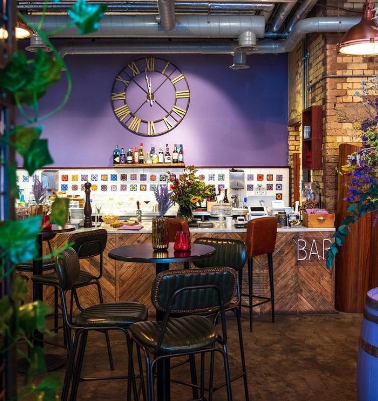 Stylish bar at Cecilia's Wine House, perfect for networking events and casual meetings.