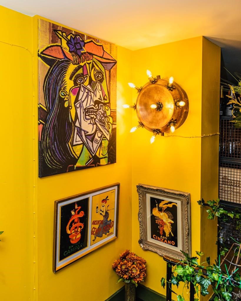 Vibrant wall display at Clemence Bar, perfect for creative meetings and networking events.