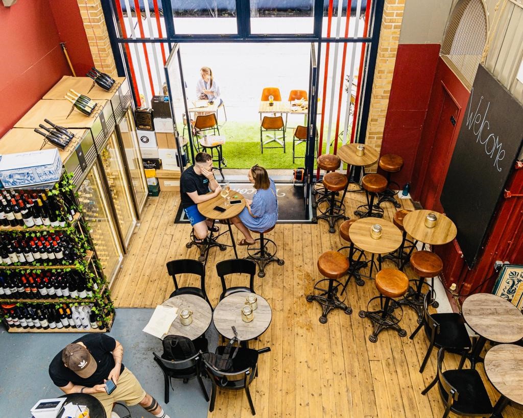 Cozy venue with rustic decor, ideal for informal meetings and social events.