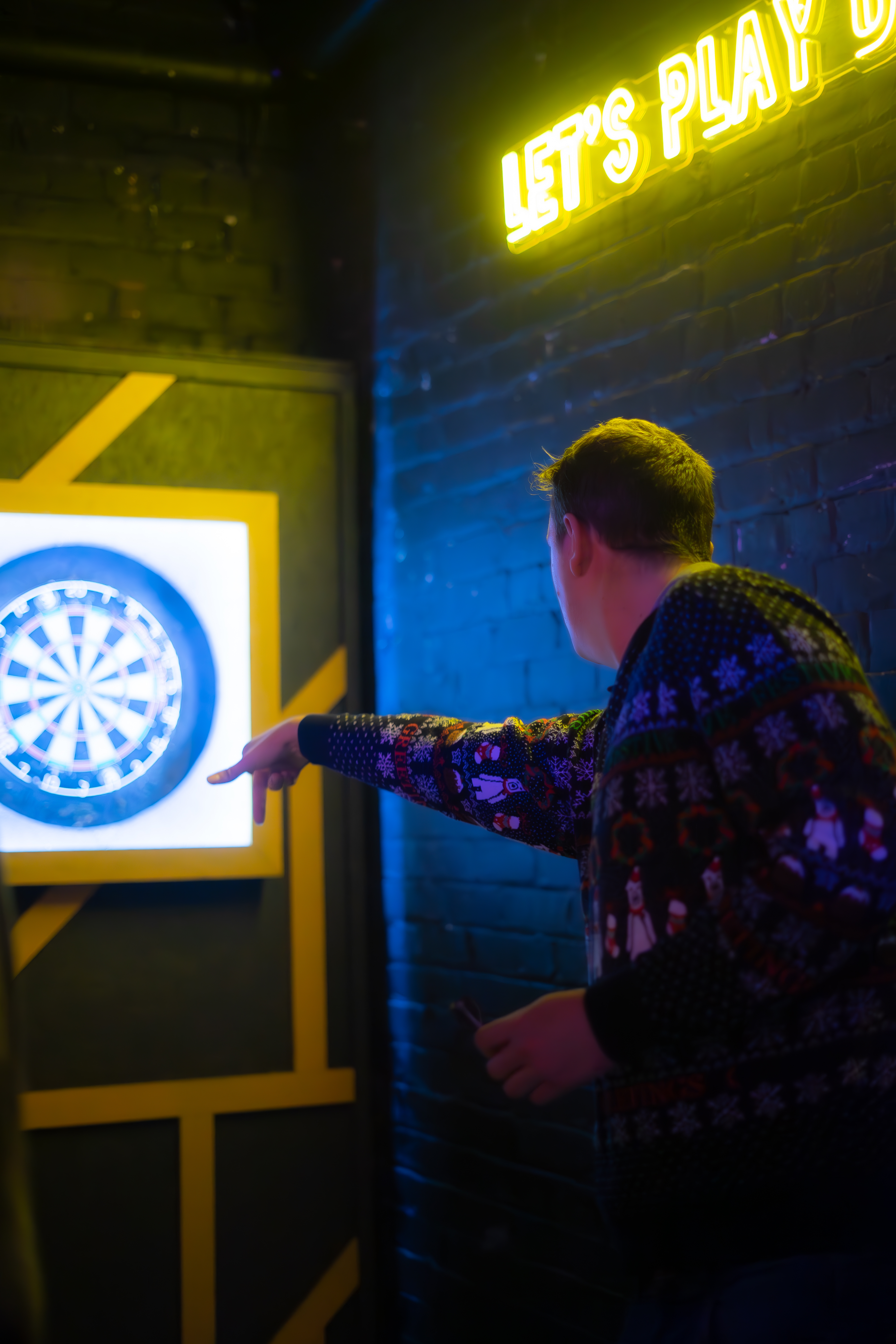 Participant enjoying interactive activity at The Lost Weekend event in The Shack NQ.