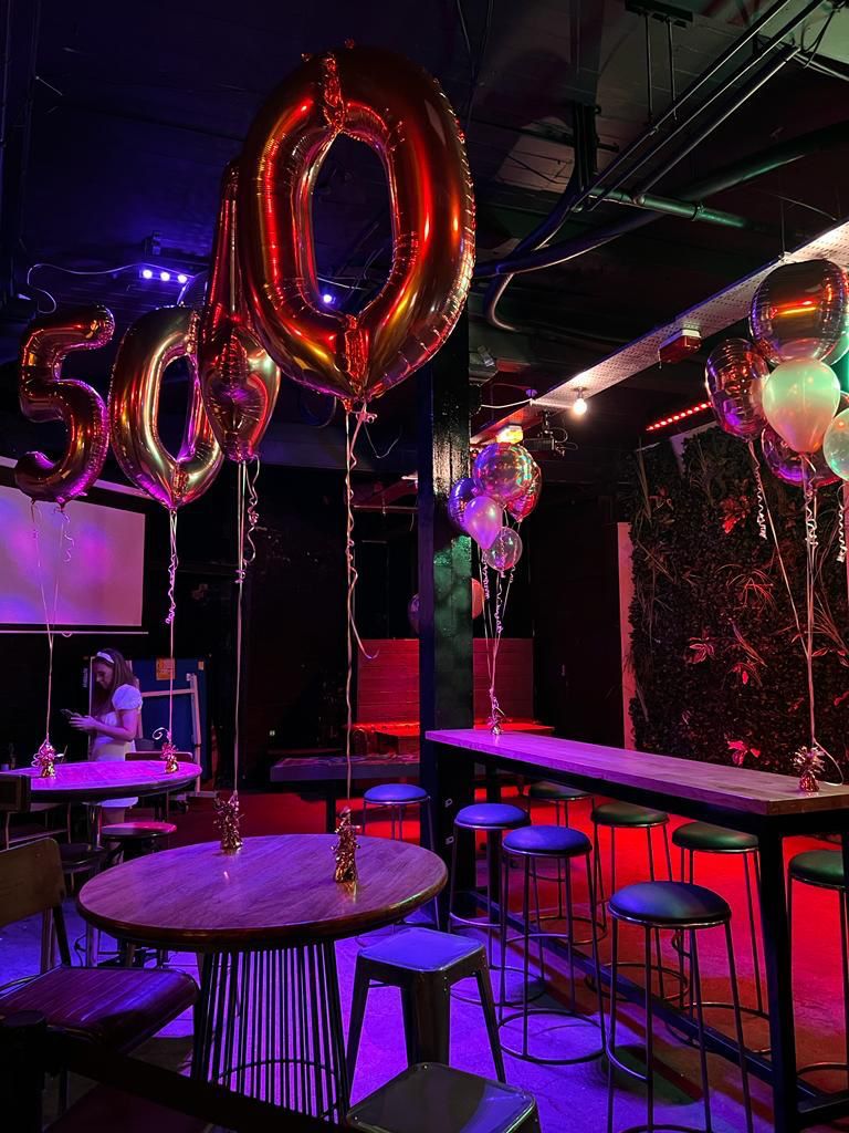 Vibrant event space with heart-shaped balloons for celebrations at The Lost Weekend, The Shack NQ.