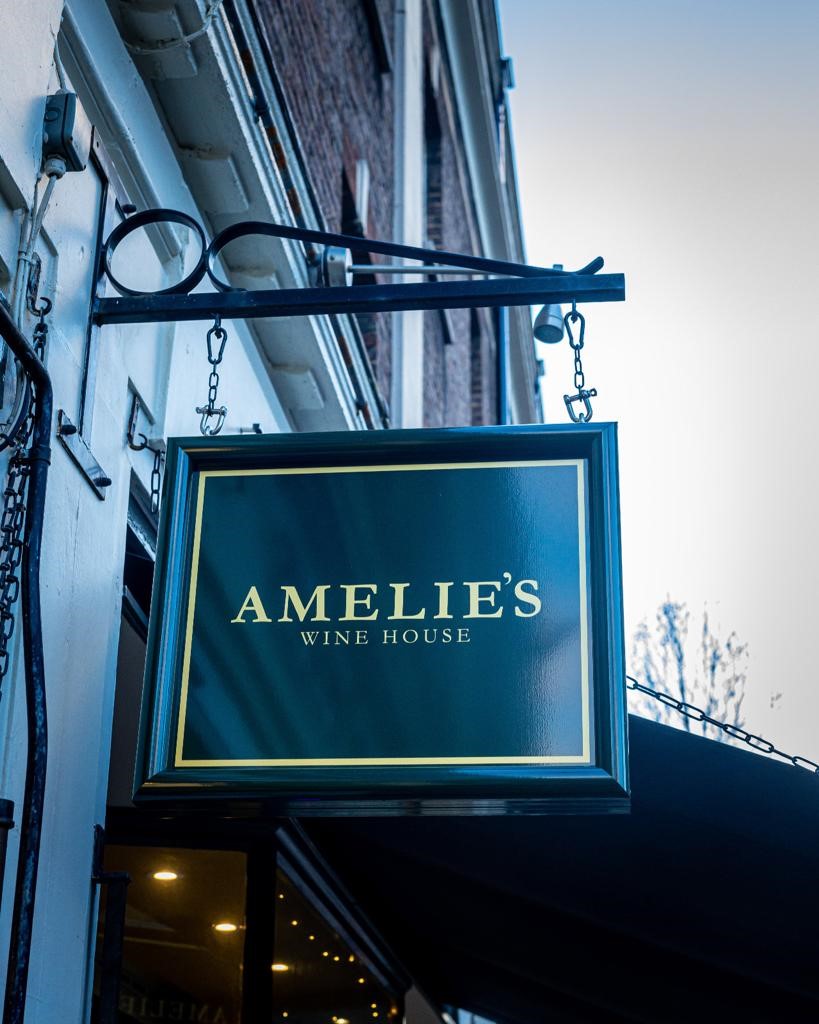 "Amelie's Wine House sign, perfect for wine tastings and corporate events."
