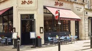 VIP area at 28-50 Oxford Circus, stylish venue for intimate gatherings and networking events.