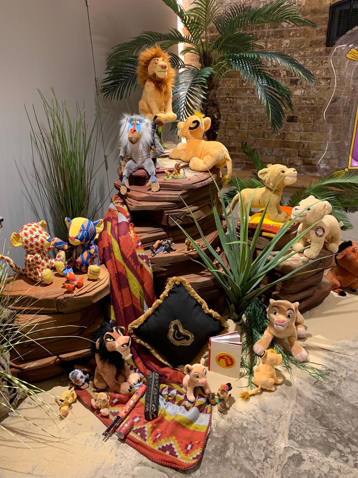 Colorful plush toys at London Bridge Arches for a family-friendly event.