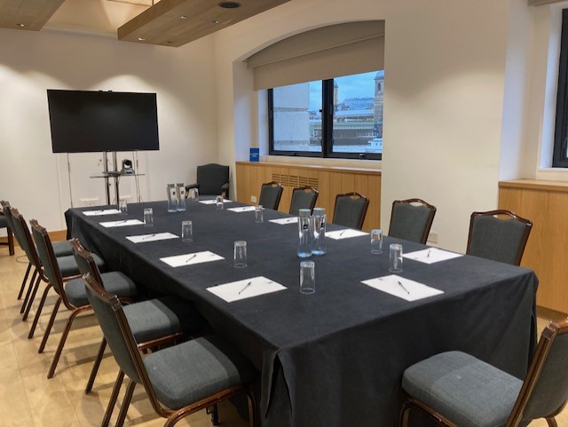 Thames Room at Glaziers Hall, modern meeting space with AV setup for professional events.