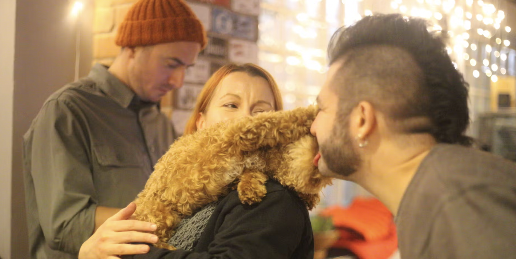 Lively networking event at Mondo Brewing Company with cozy atmosphere and playful dog.