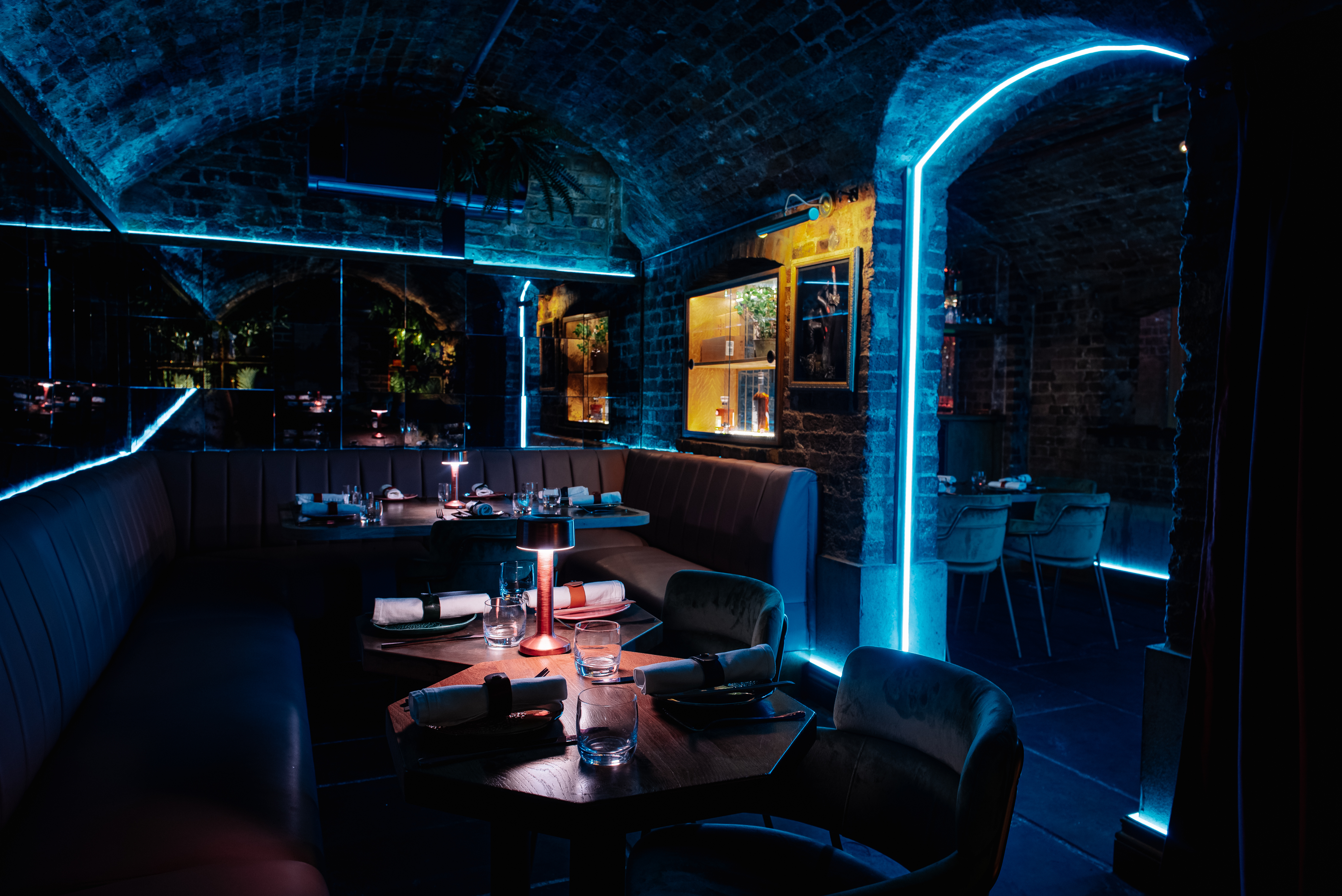 VIP event space in Cache Cache with stylish lighting and modern décor for upscale gatherings.