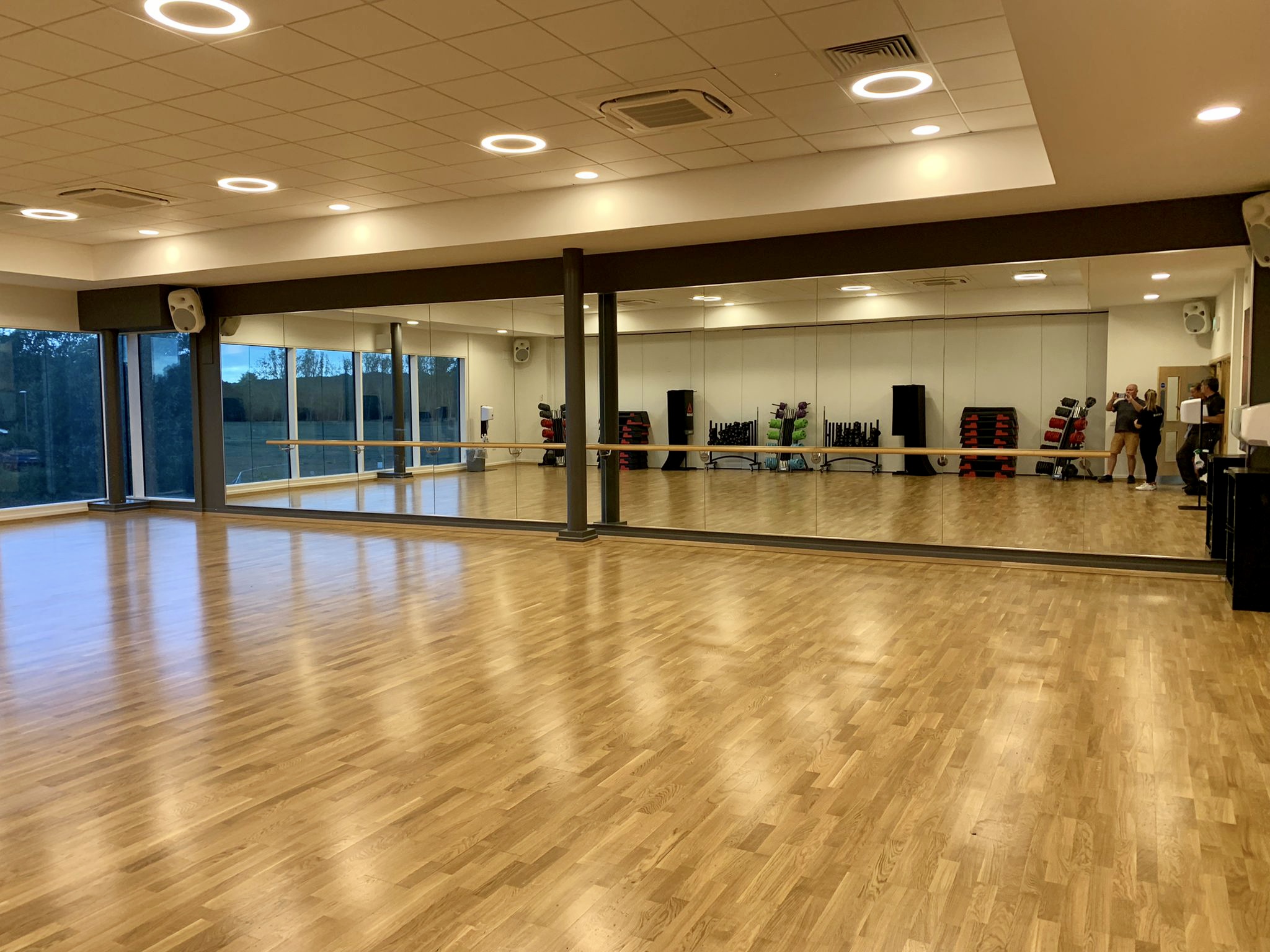 Spacious gym with polished wooden floors, ideal for dance classes and fitness events in Basildon.