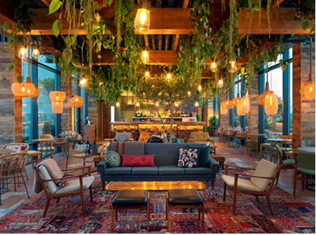 Stylish event space at The Nest, Treehouse Hotel, perfect for networking and gatherings.