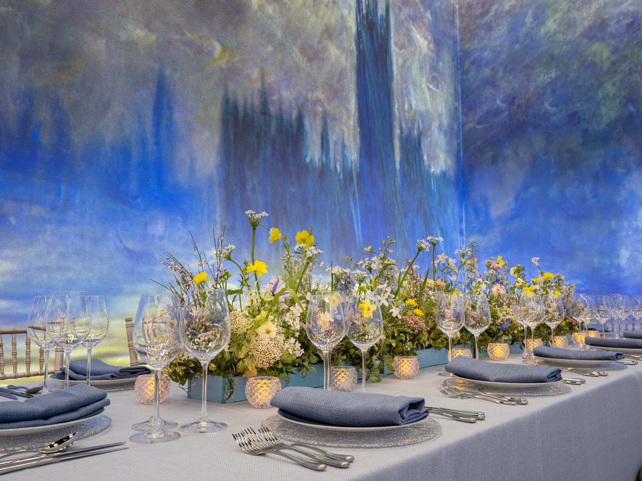 Elegant dining table with floral arrangements for upscale events and intimate gatherings.