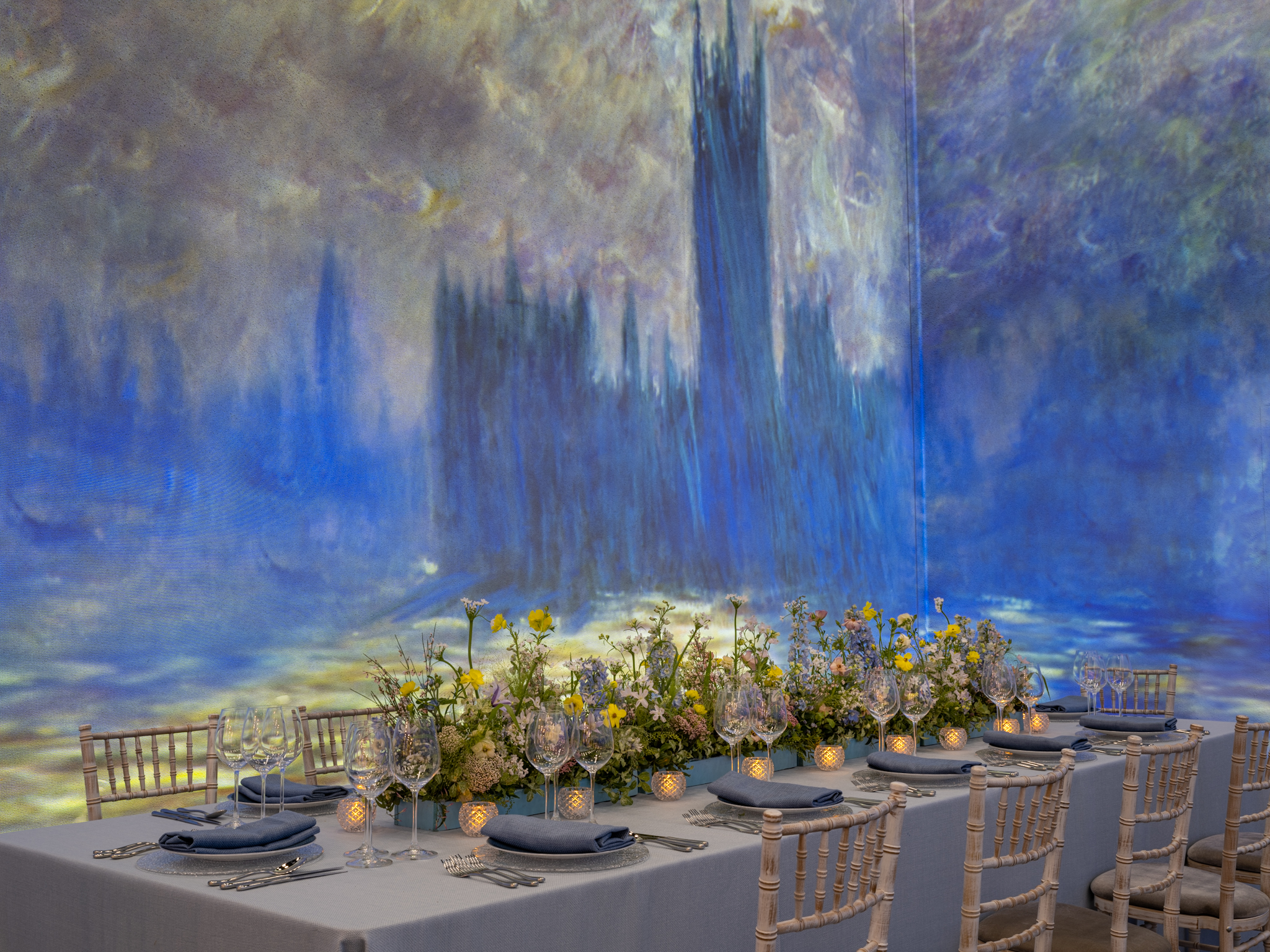 Elegant dining table with floral centerpieces for upscale gala dinners.