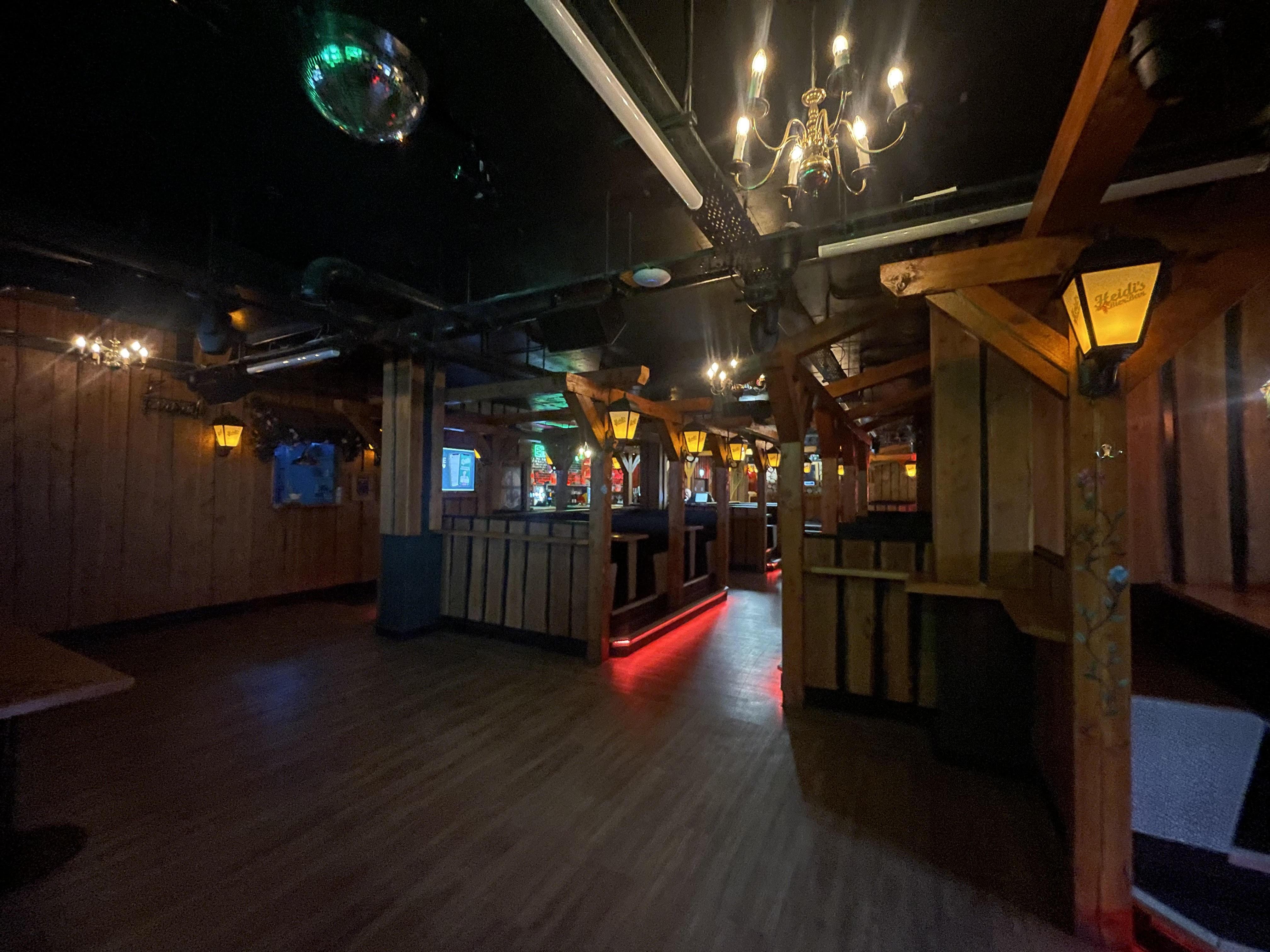 Rustic event space with wooden beams and disco ball for parties in Birmingham.