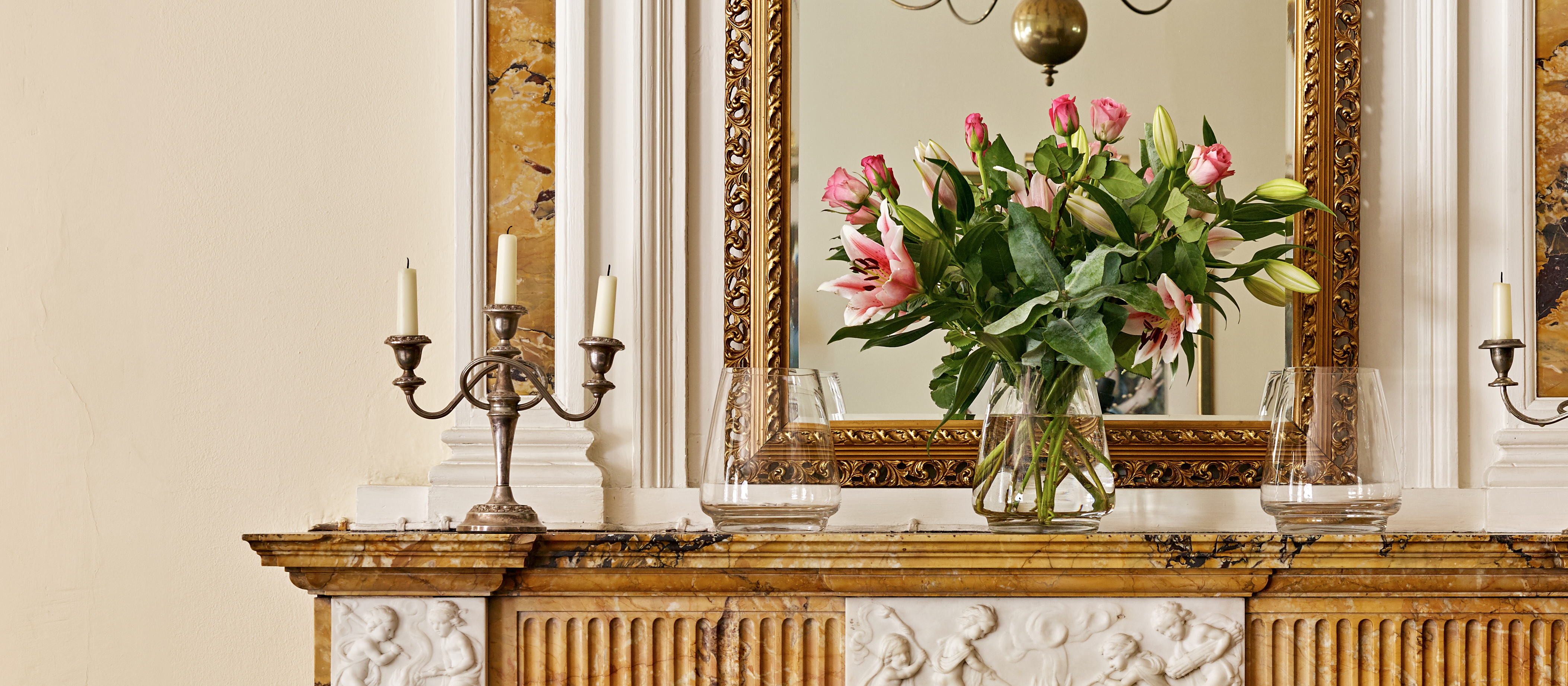 Elegant dining room with floral centerpiece, perfect for upscale events and meetings.